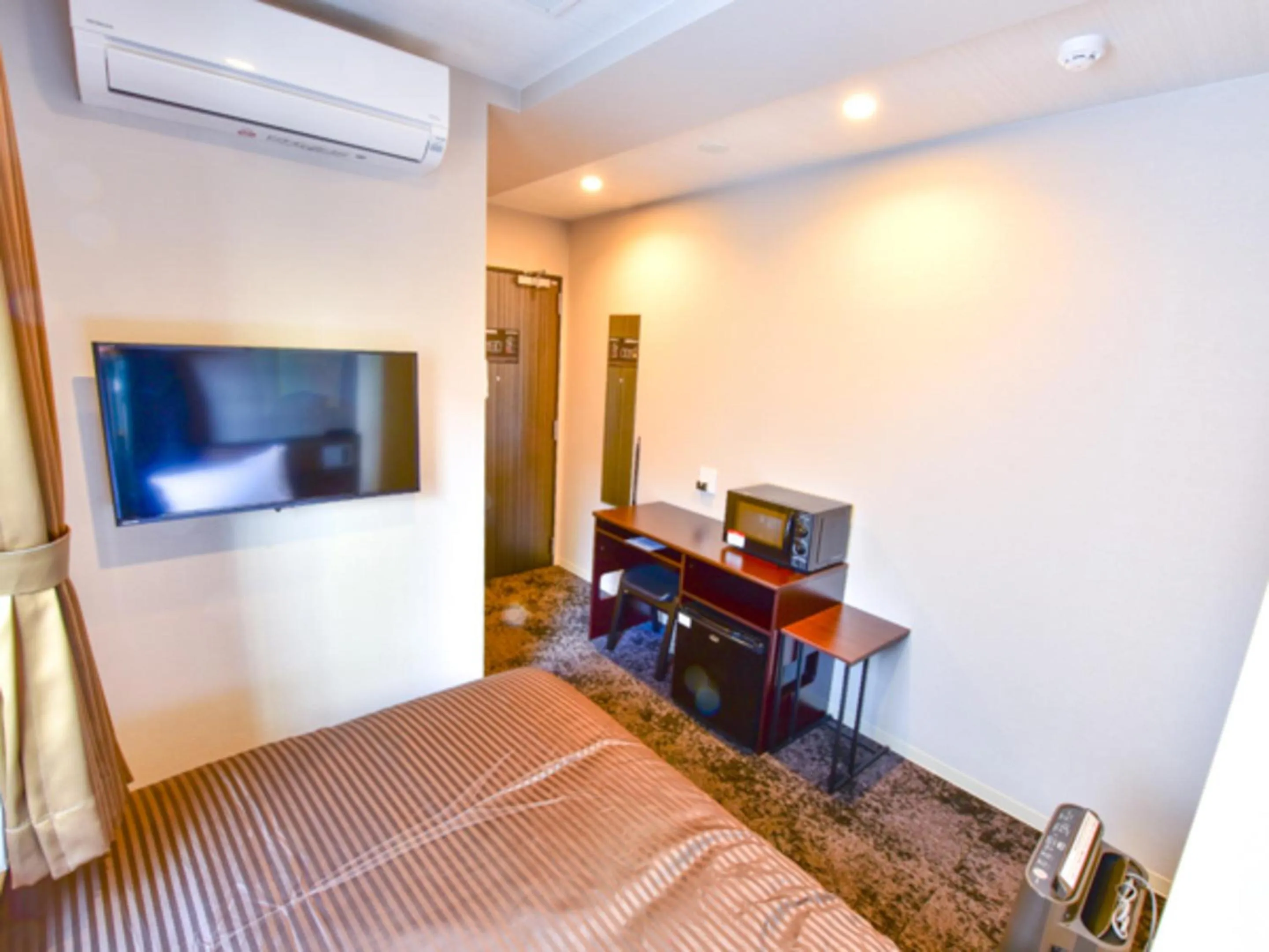 Bed in HOTEL LiVEMAX Fukuoka Tenjin West