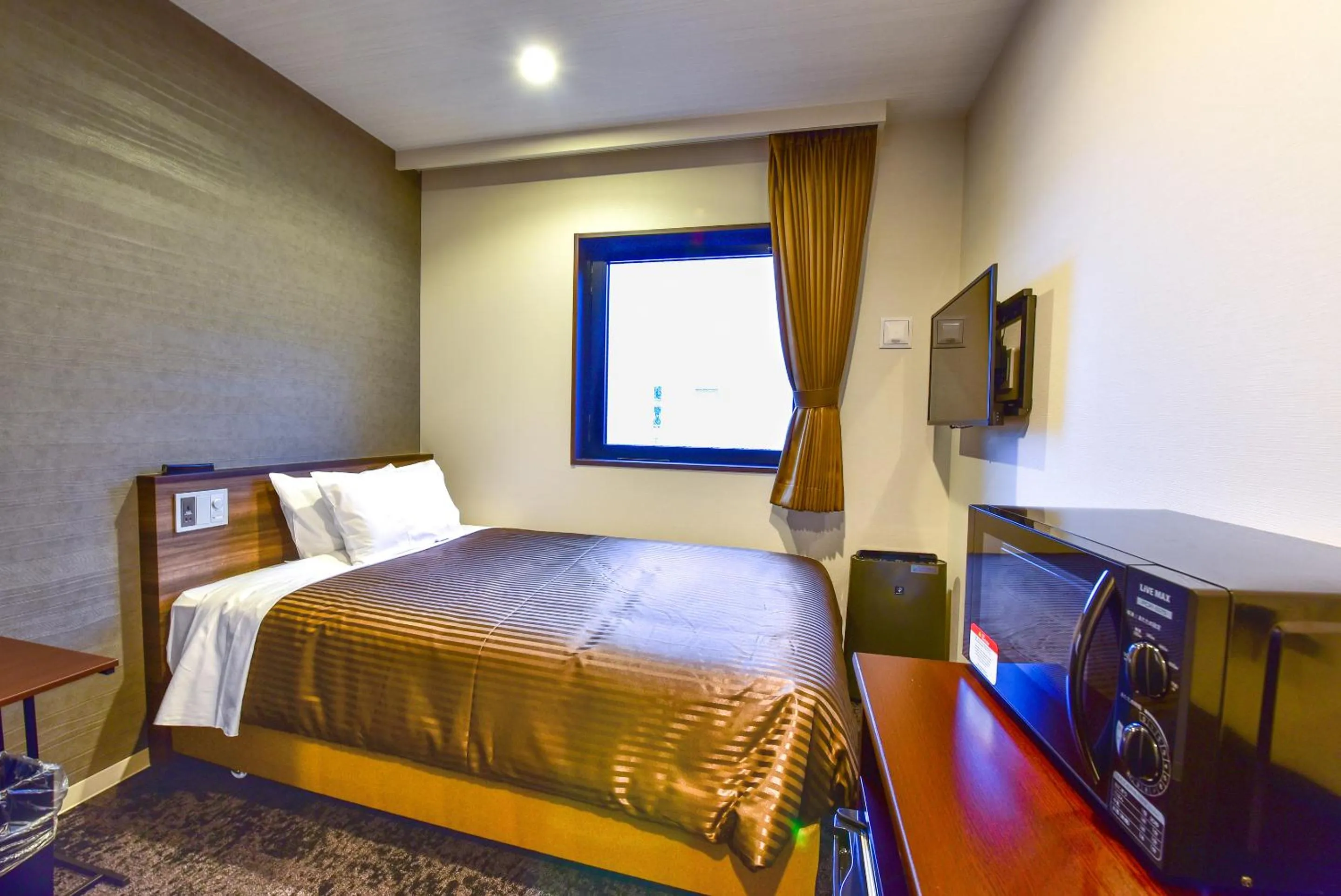 Bed in HOTEL LiVEMAX Fukuoka Tenjin West