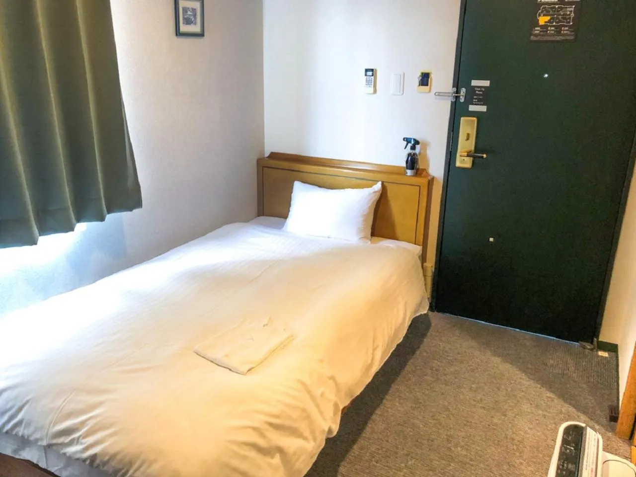Bed in HOTEL LiVEMAX BUDGET Naha Matsuyama