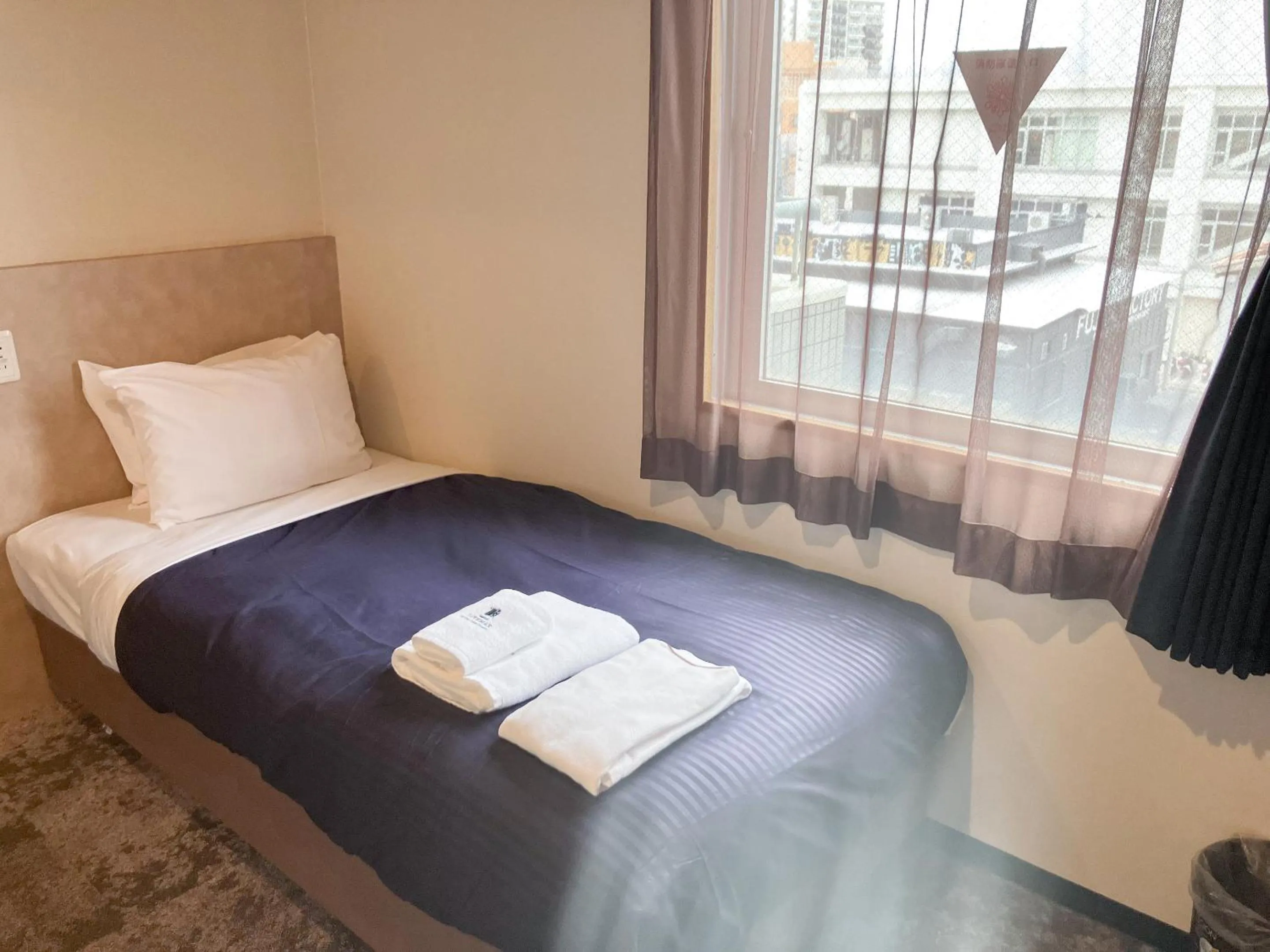 Photo of the whole room, Bed in HOTEL LiVEMAX BUDGET Naha Matsuyama