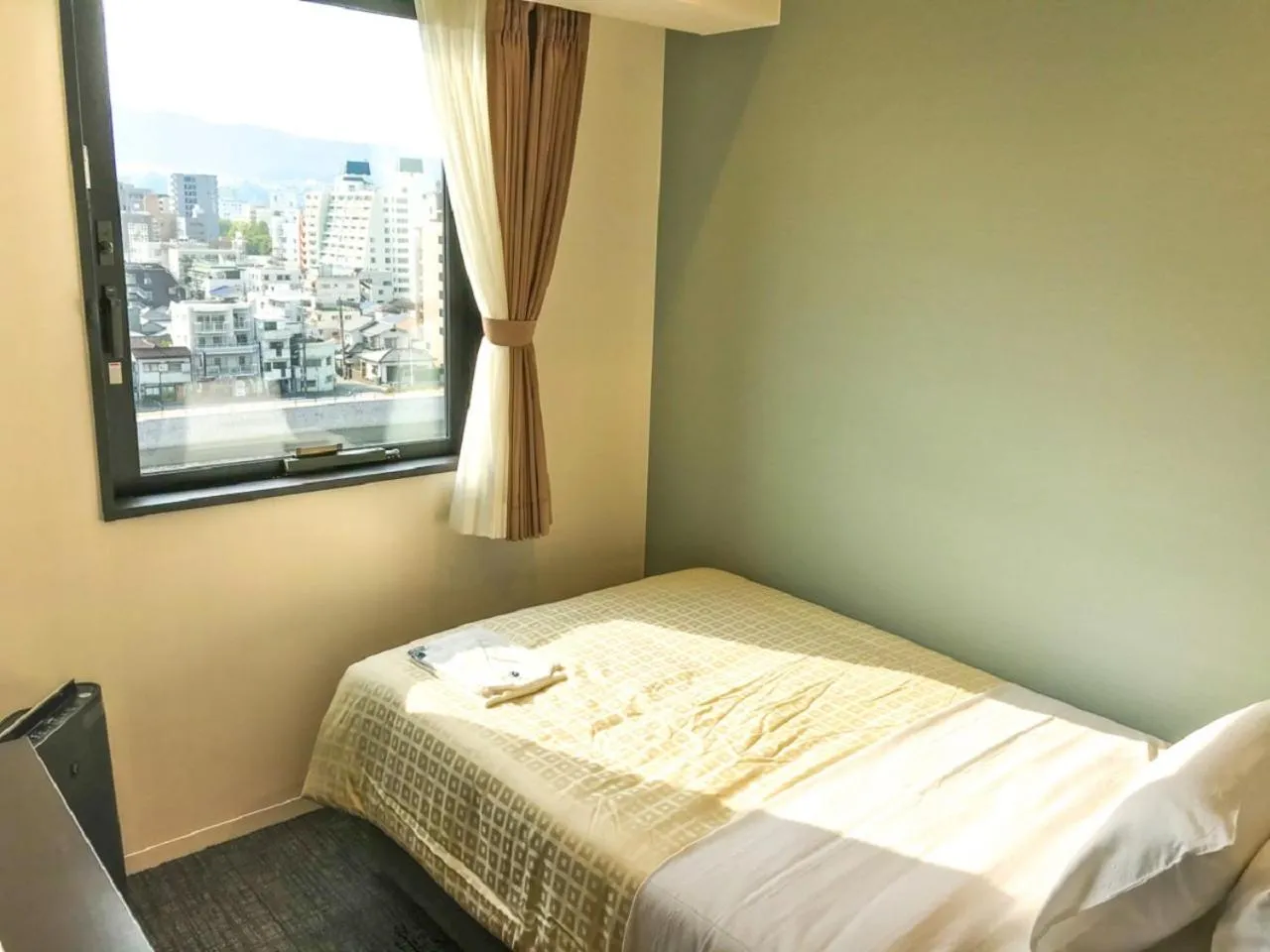 Bed in HOTEL LiVEMAX Hiroshima Funairimachi Riverside