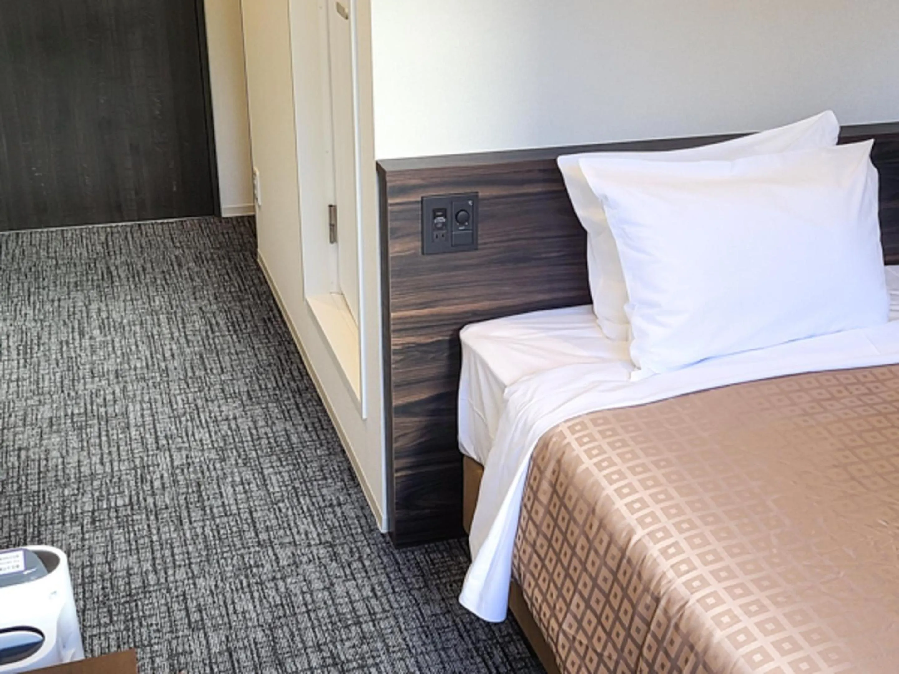 Bed in Hotel Livemax Premium Nagano Ekimae