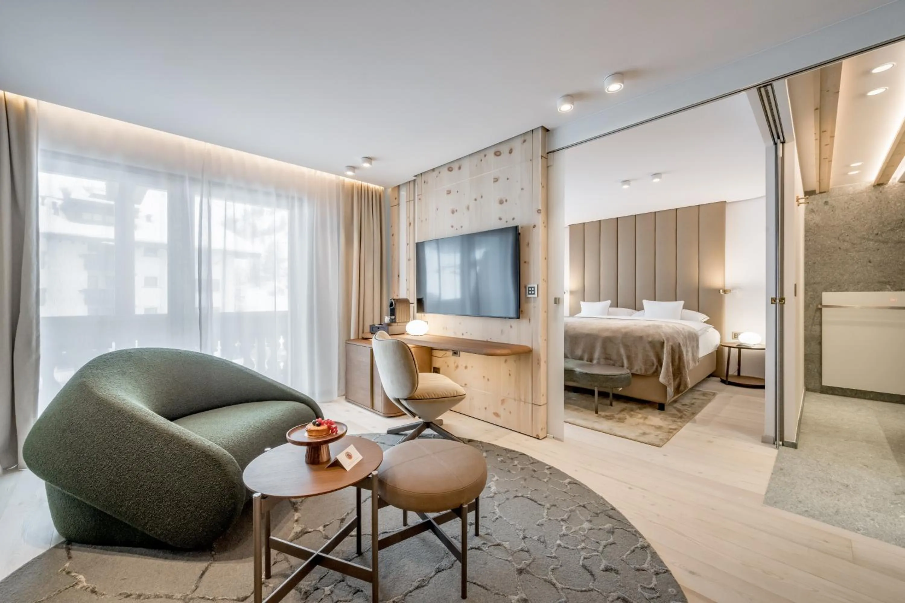 Photo of the whole room, Bed in Relais & Châteaux Chasa Montana