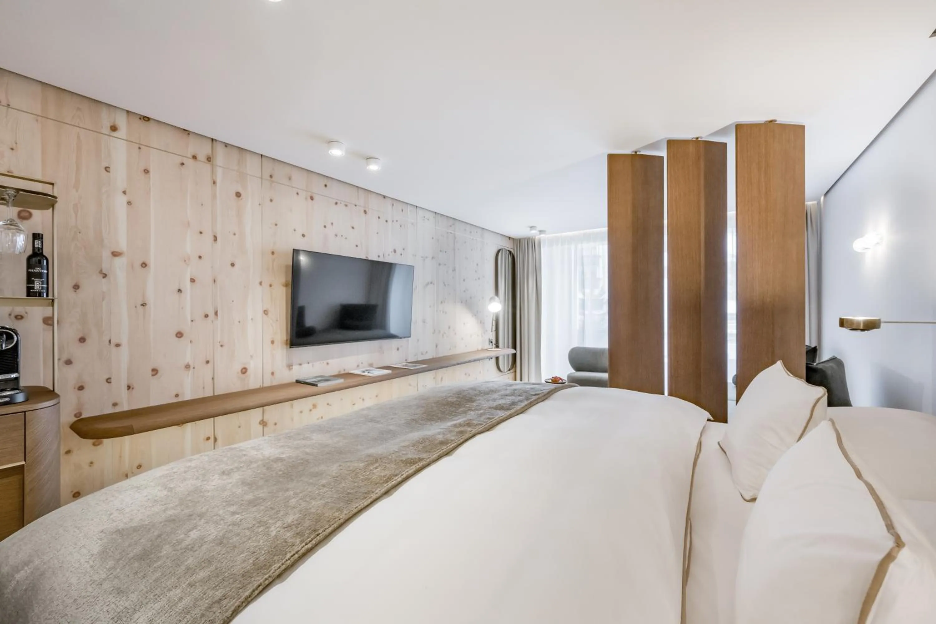 Photo of the whole room, Bed in Relais & Châteaux Chasa Montana