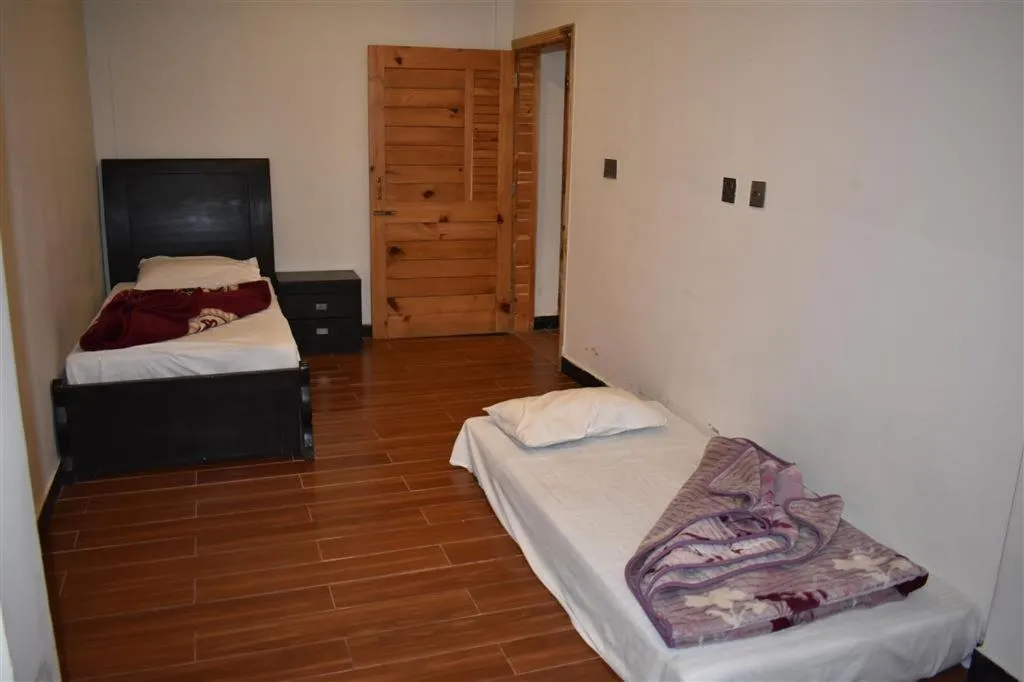 Bed in Hotel Royal Inn