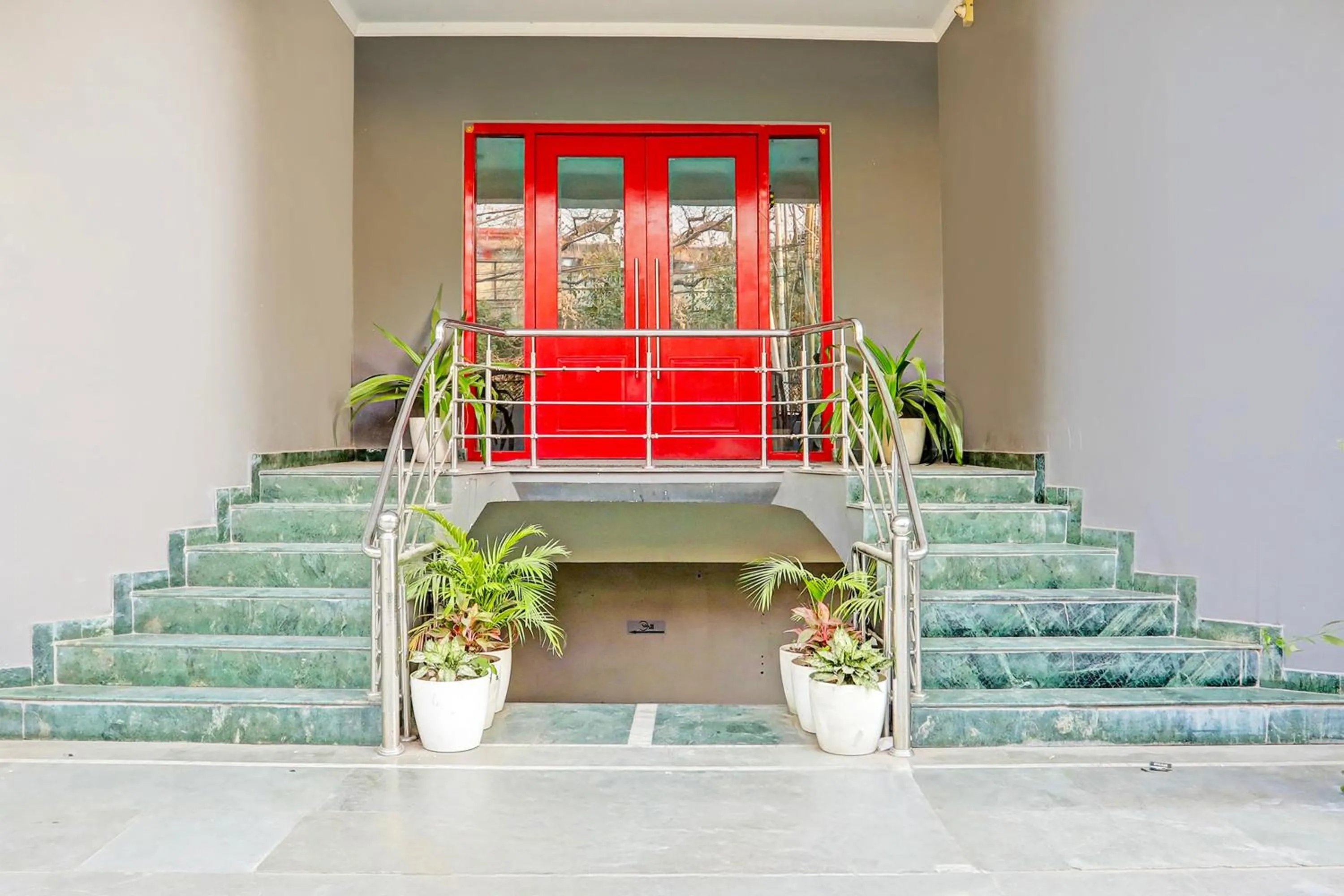 Facade/entrance in Super Townhouse Vijay Khand Gomti Nagar