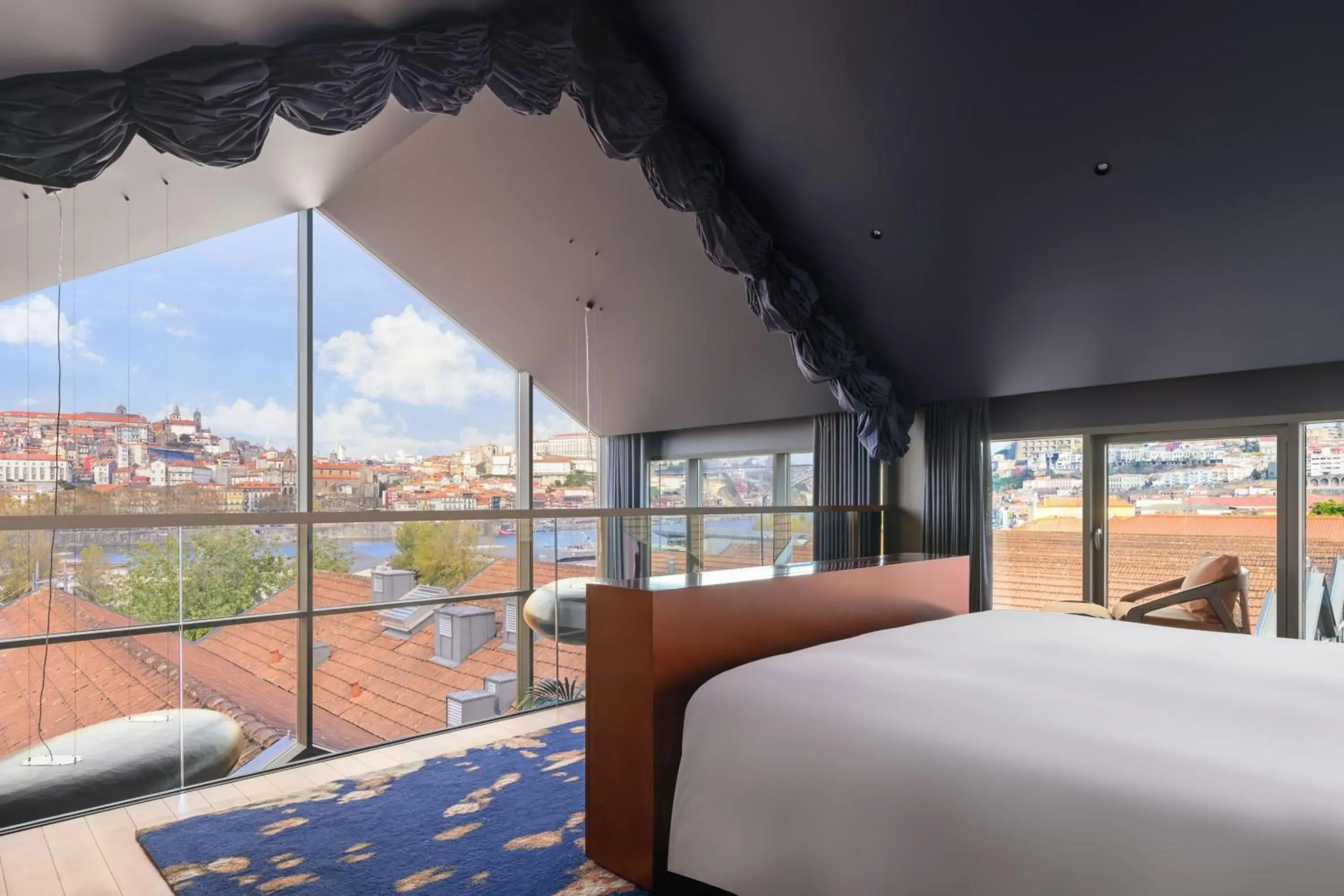 Photo of the whole room, Bed in Forte de Gaia, Autograph Collection Photo of the whole room, Bed in Forte de Gaia, Autograph Collection