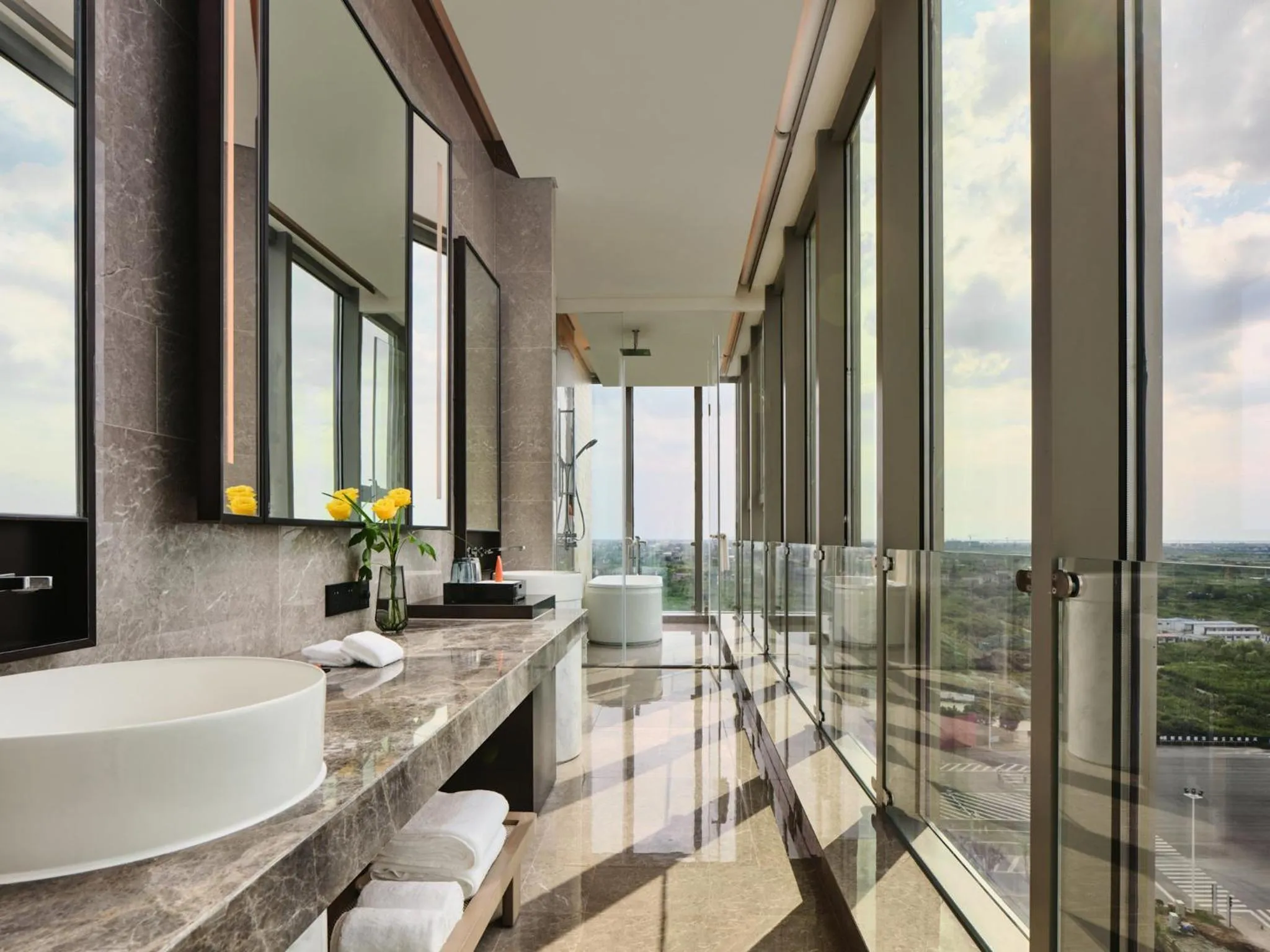 Bathroom in Crowne Plaza Qidong by IHG