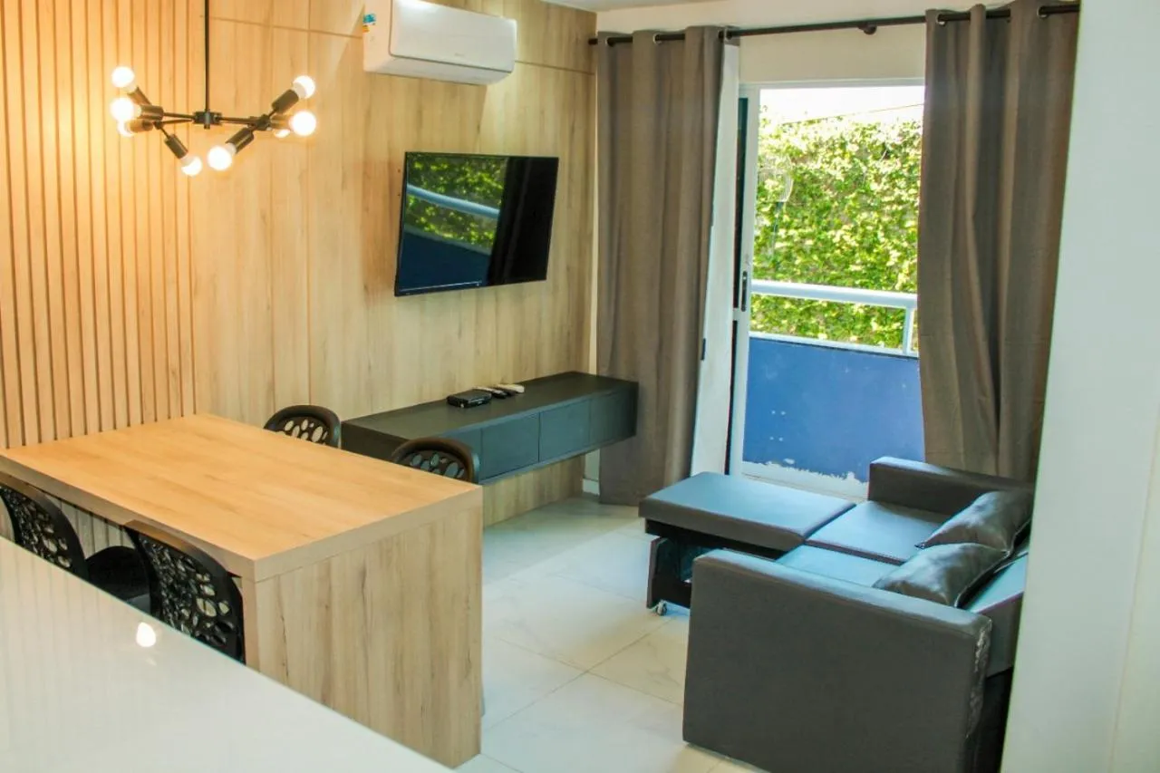 Communal lounge/ TV room in Ponta Negra Beach Flat Prime