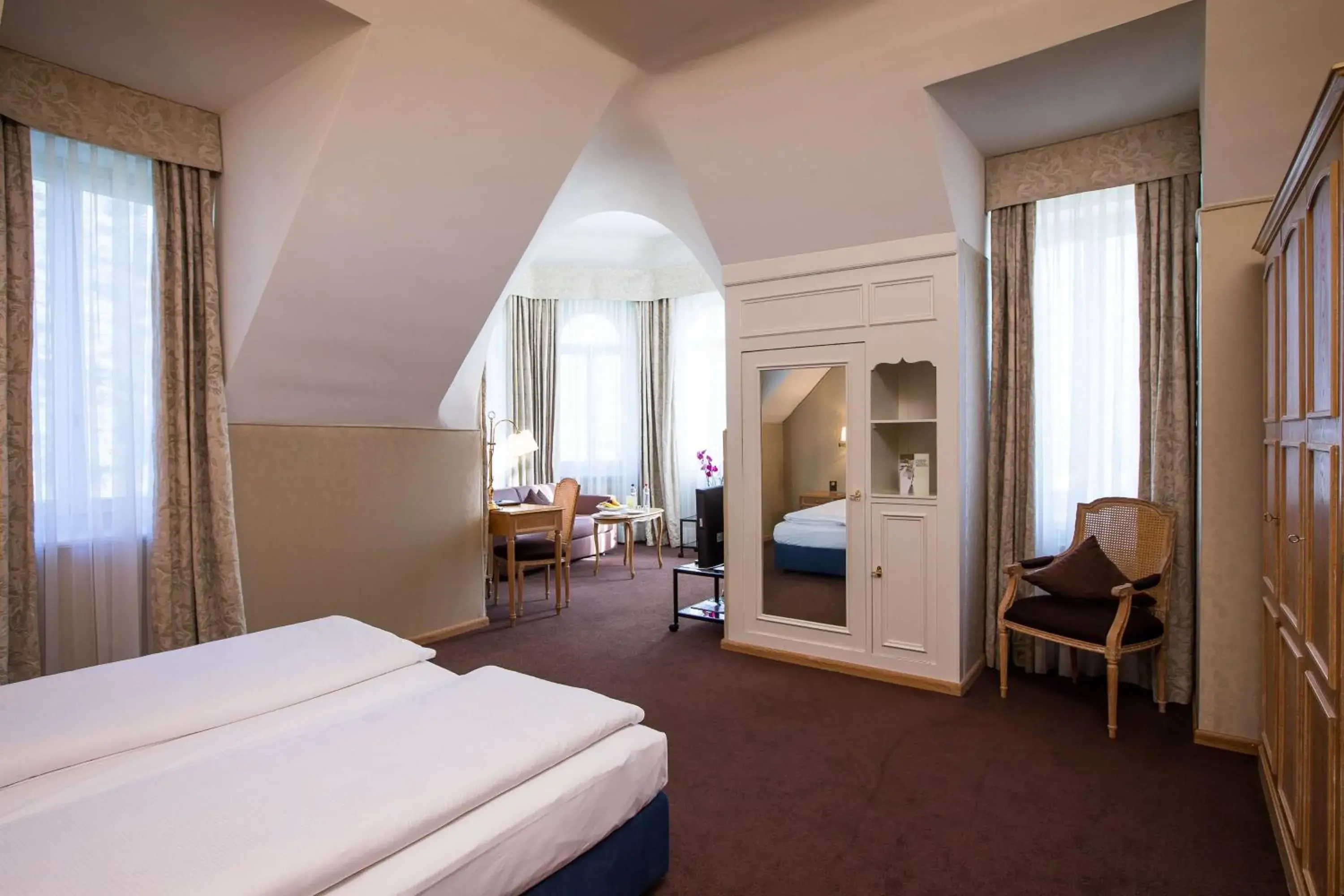 Photo of the whole room, Bed in Lindner Grand Hotel Beau Rivage