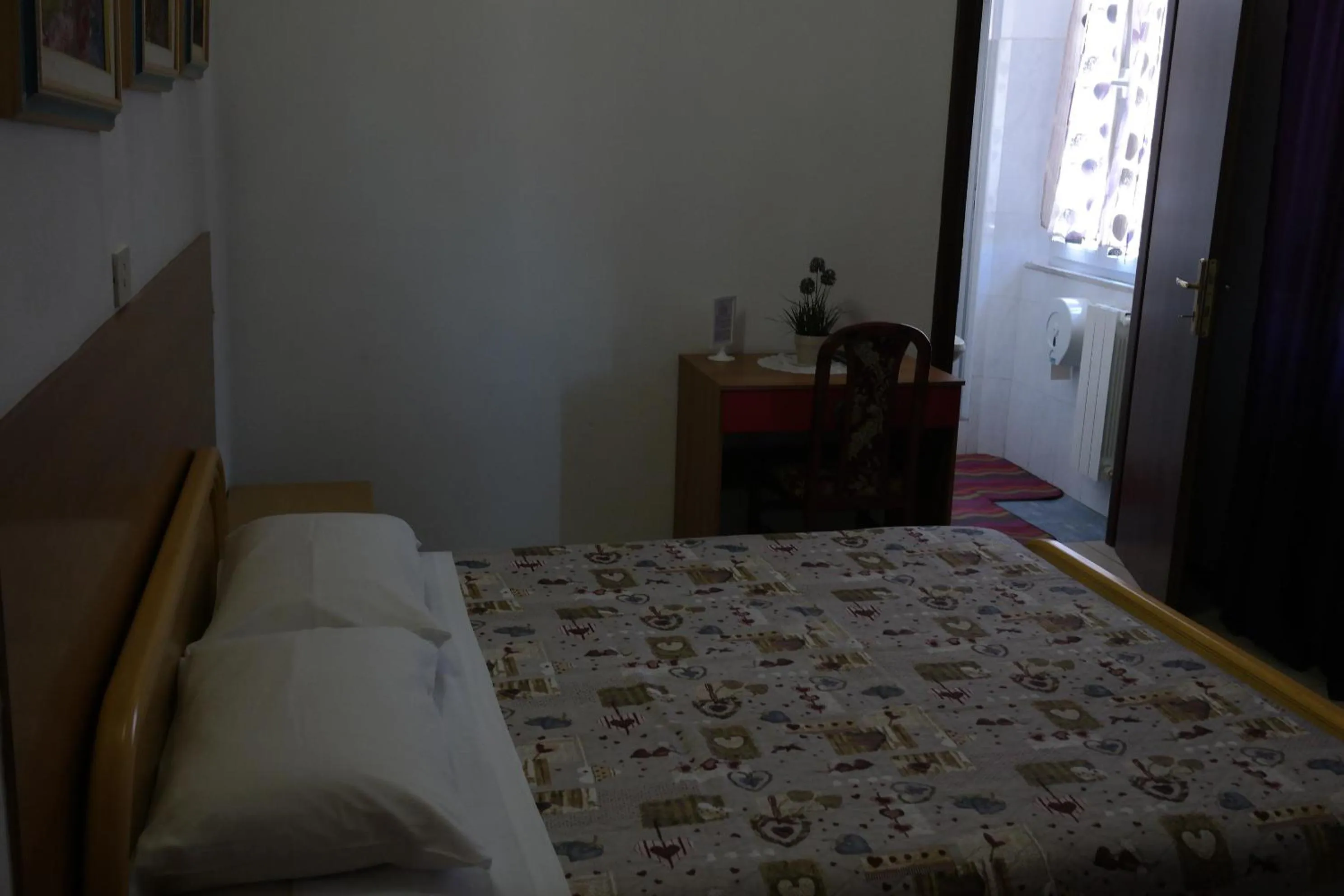 Photo of the whole room, Bed in Hotel Houston Livorno - Struttura Esclusivamente Turistica - Not for Business or Workers