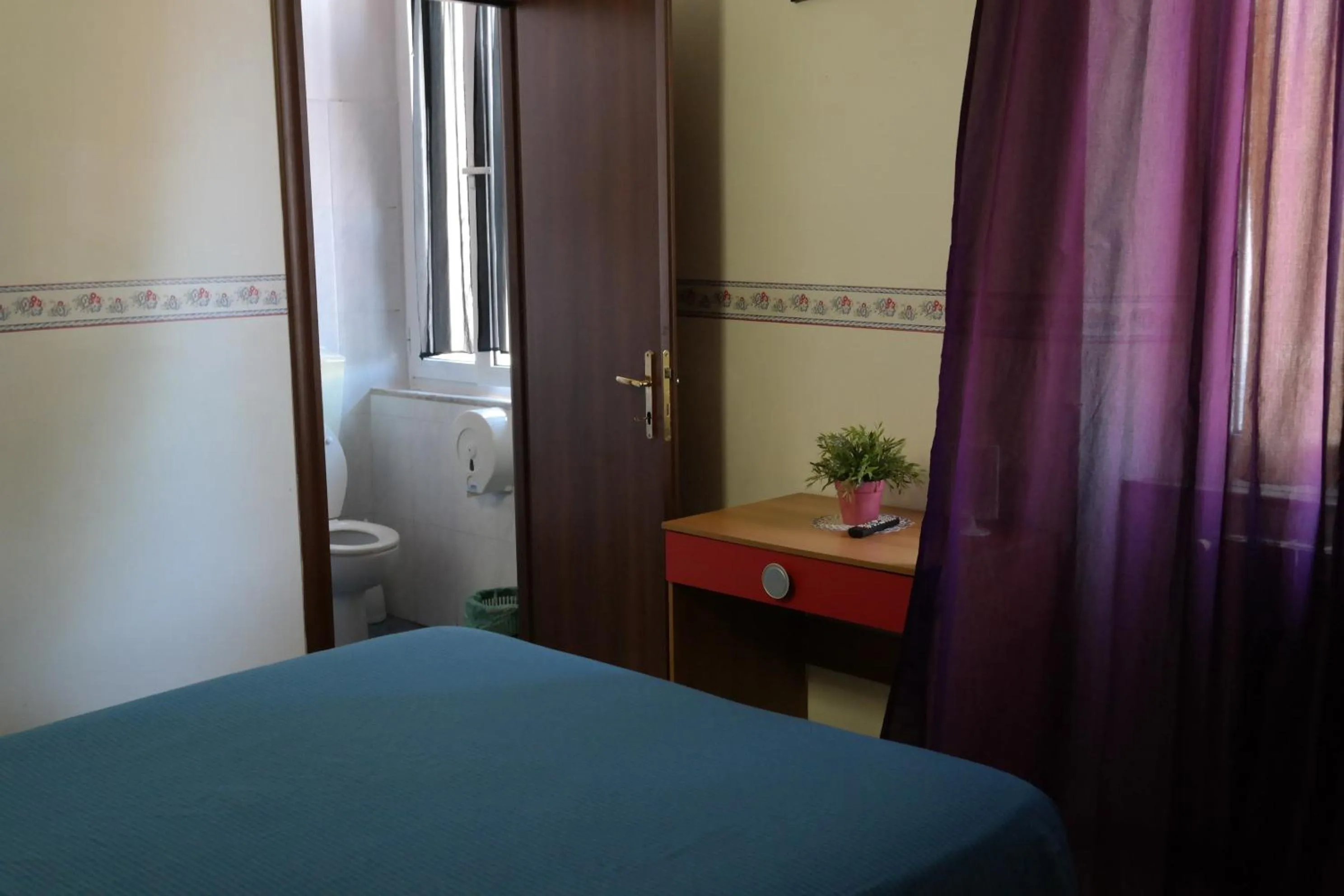 Photo of the whole room, Bed in Hotel Houston Livorno - Struttura Esclusivamente Turistica - Not for Business or Workers