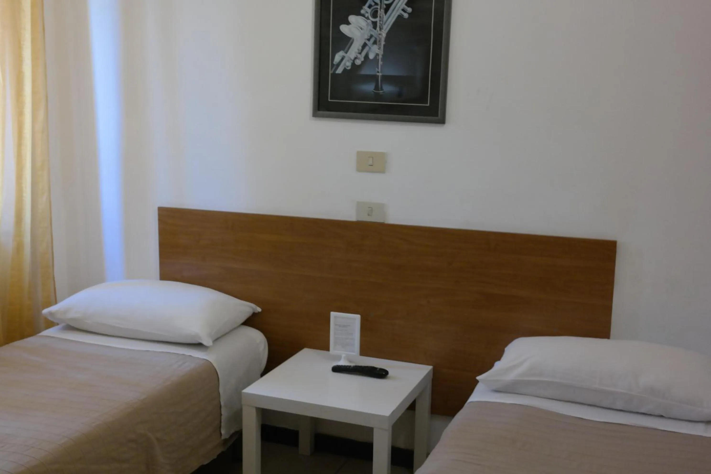 Photo of the whole room, Bed in Hotel Houston Livorno - Struttura Esclusivamente Turistica - Not for Business or Workers