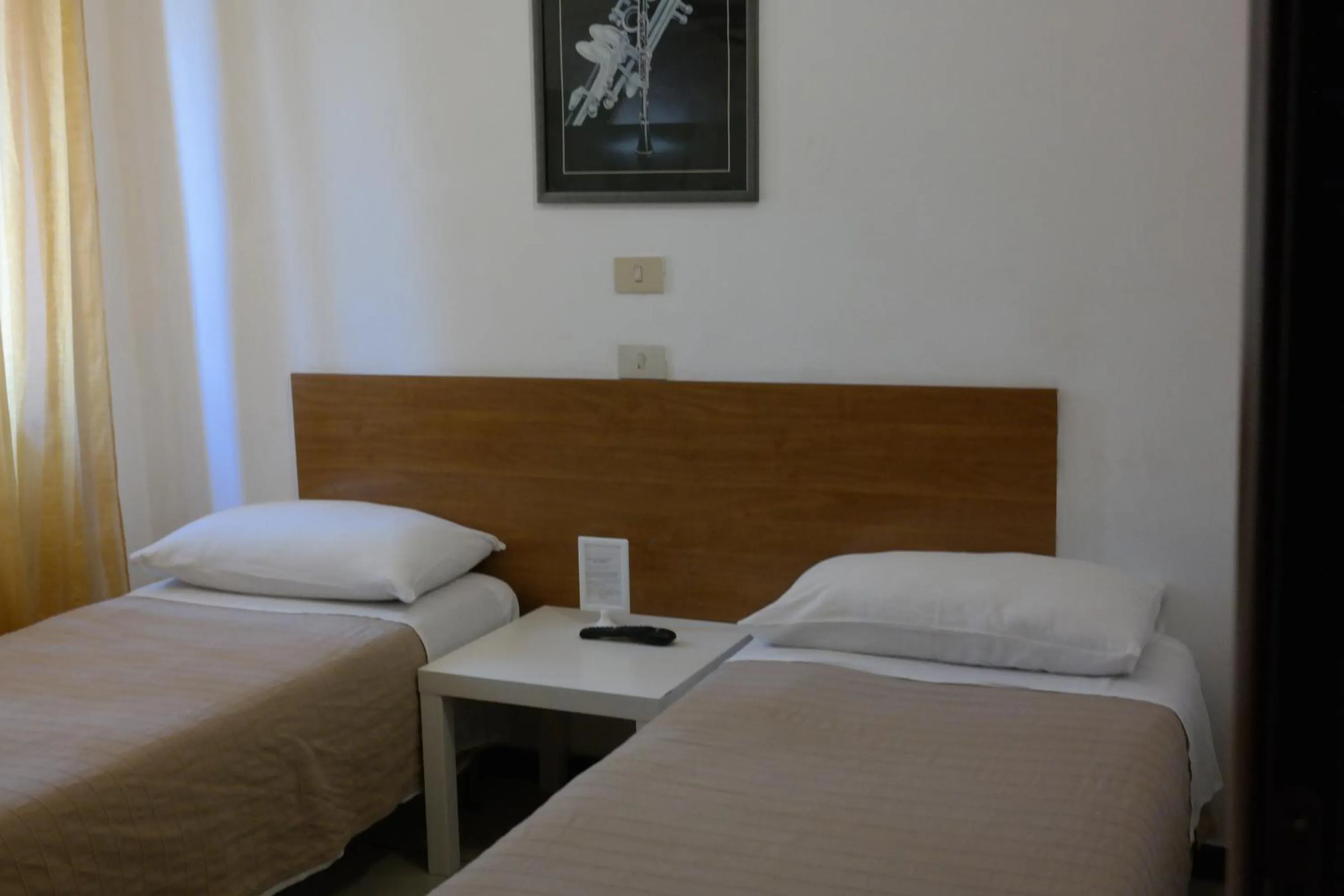 Photo of the whole room, Bed in Hotel Houston Livorno - Struttura Esclusivamente Turistica - Not for Business or Workers