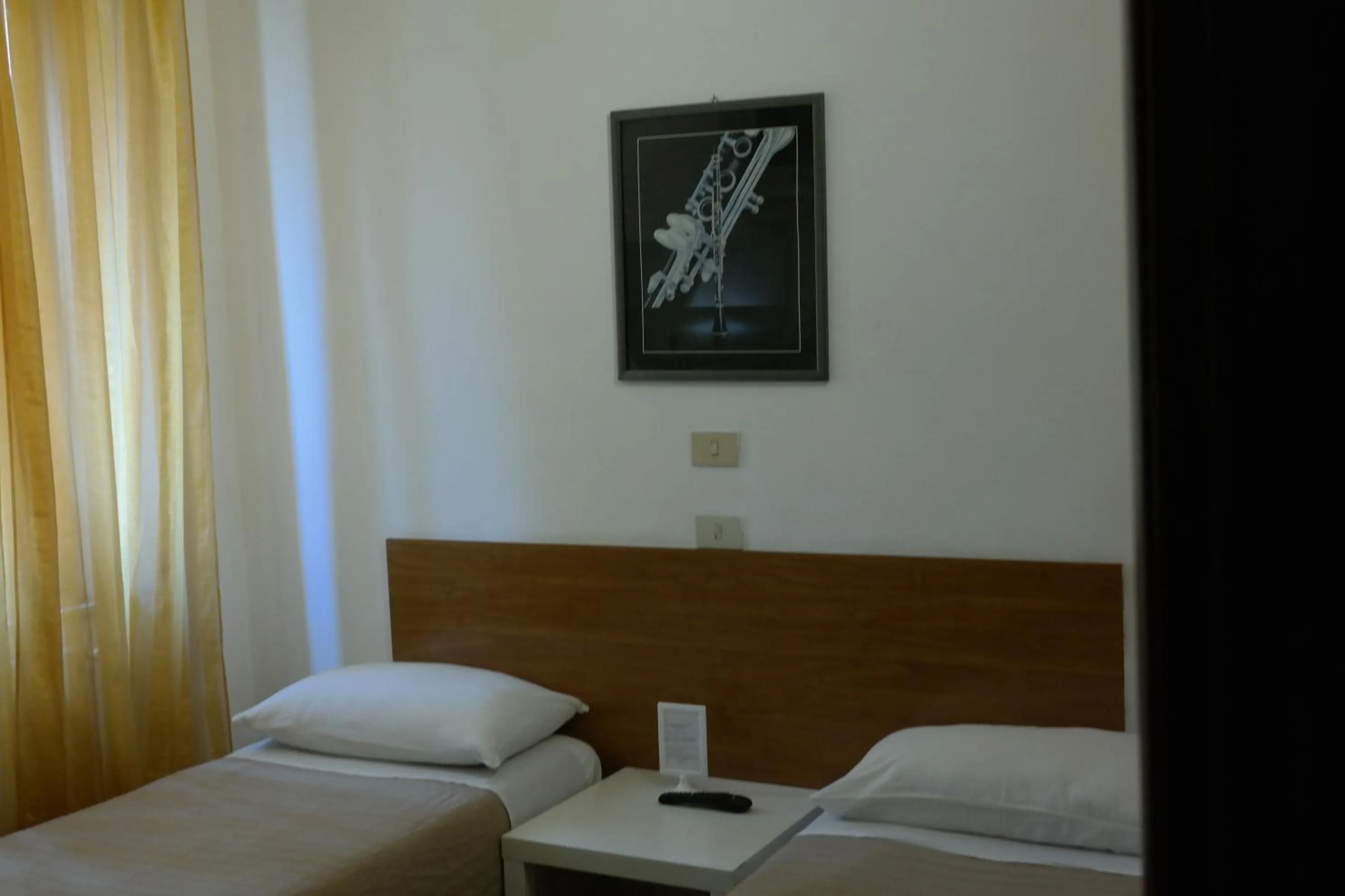 Photo of the whole room, Bed in Hotel Houston Livorno - Struttura Esclusivamente Turistica - Not for Business or Workers