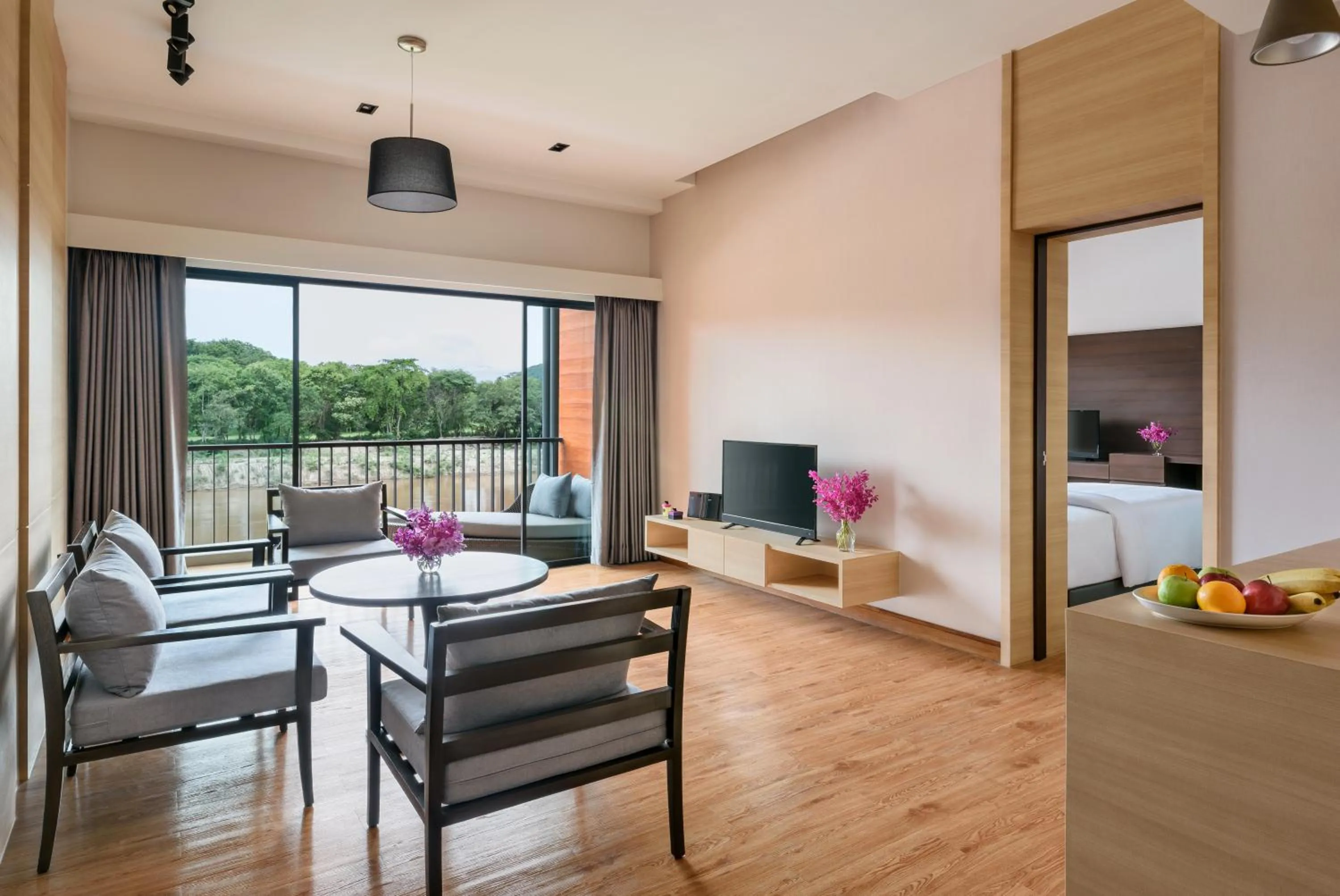 Living room in Chainarai Riverside - SHA Plus Certified