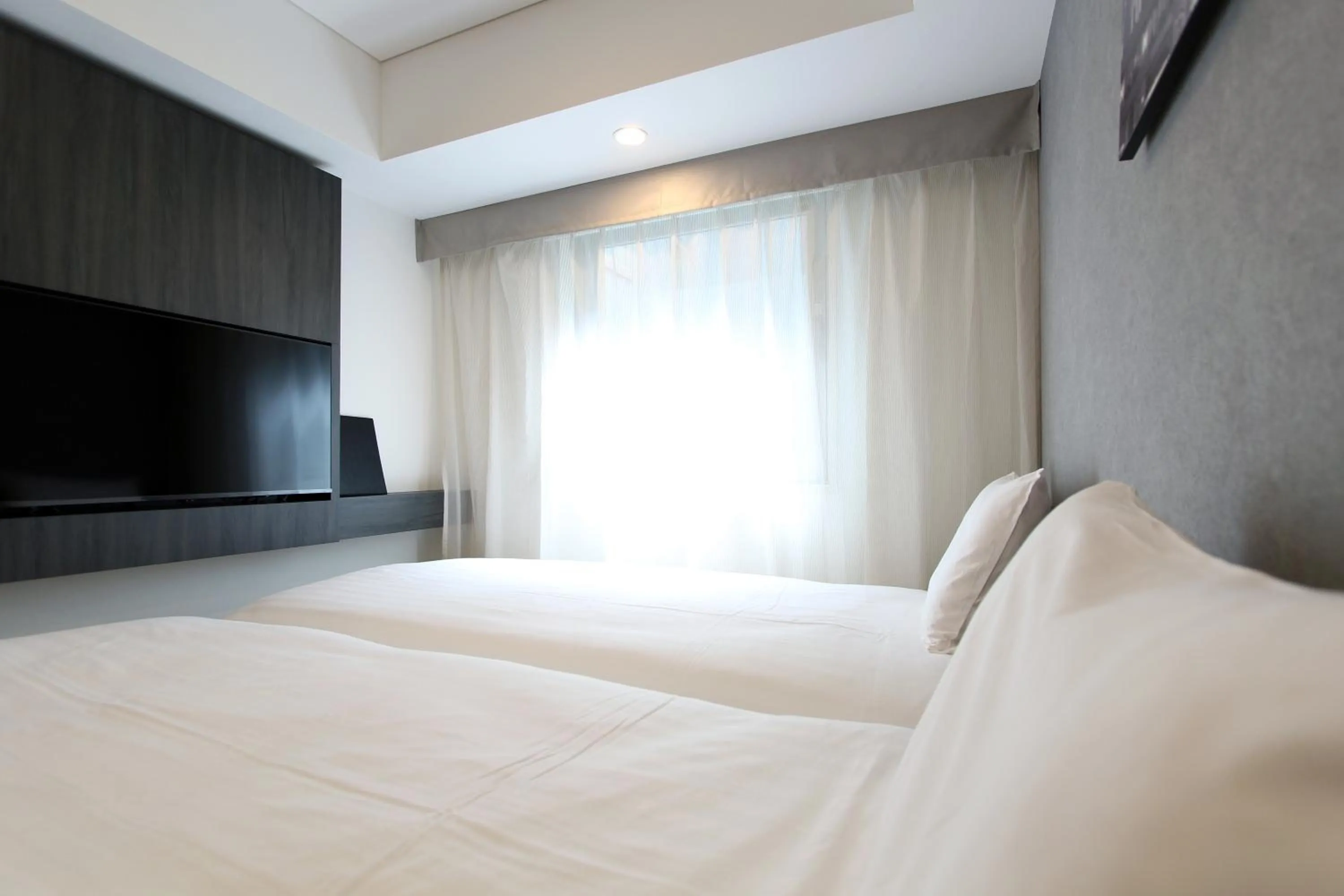 Photo of the whole room, Bed in KOKO HOTEL Ginza-1chome