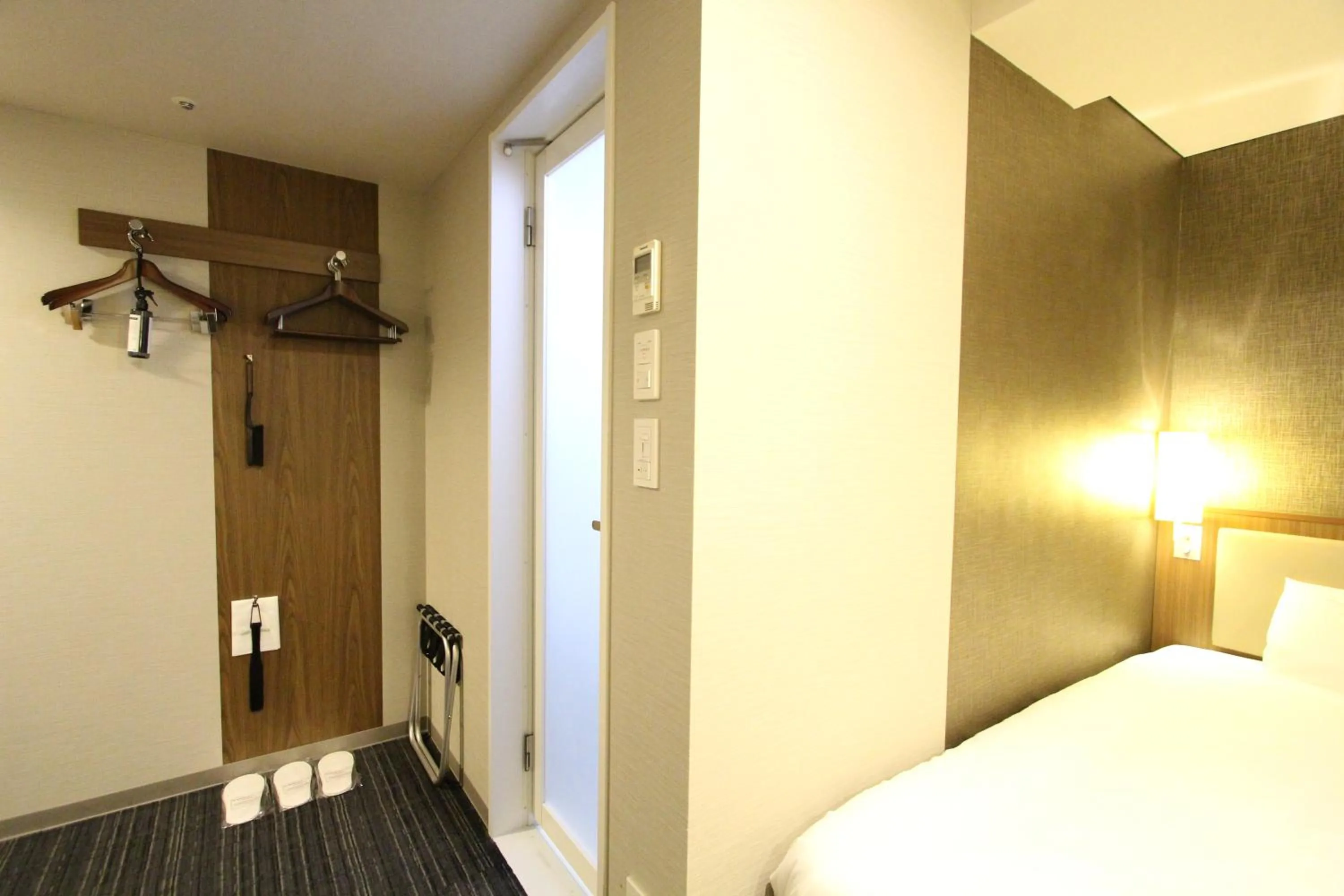 Photo of the whole room, Bed in KOKO HOTEL Ginza-1chome