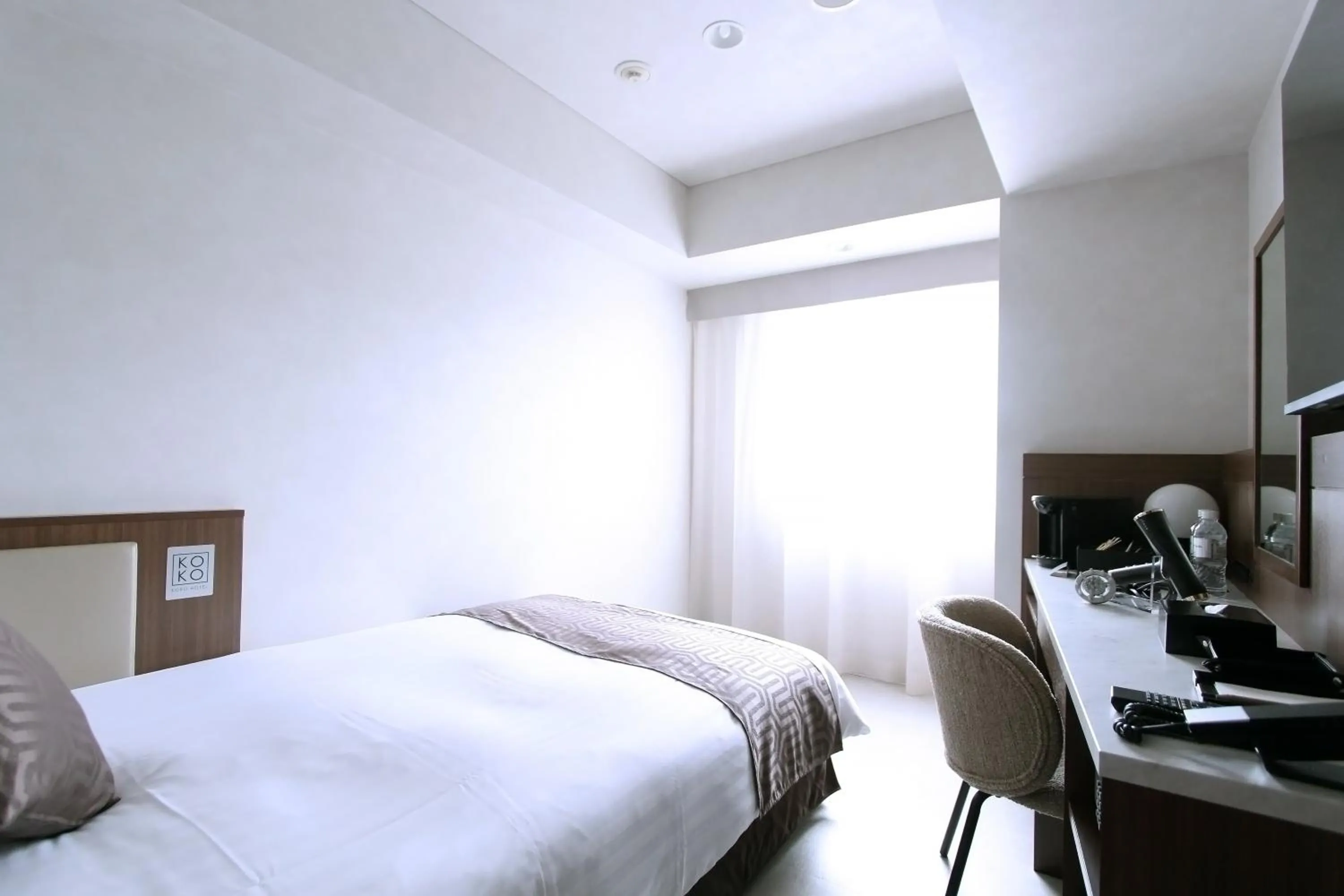 Photo of the whole room, Bed in KOKO HOTEL Ginza-1chome