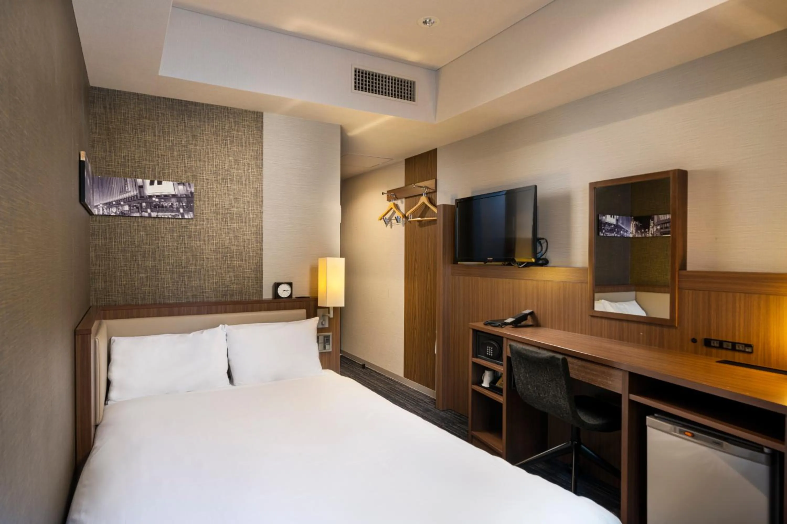 Photo of the whole room, Bed in KOKO HOTEL Ginza-1chome