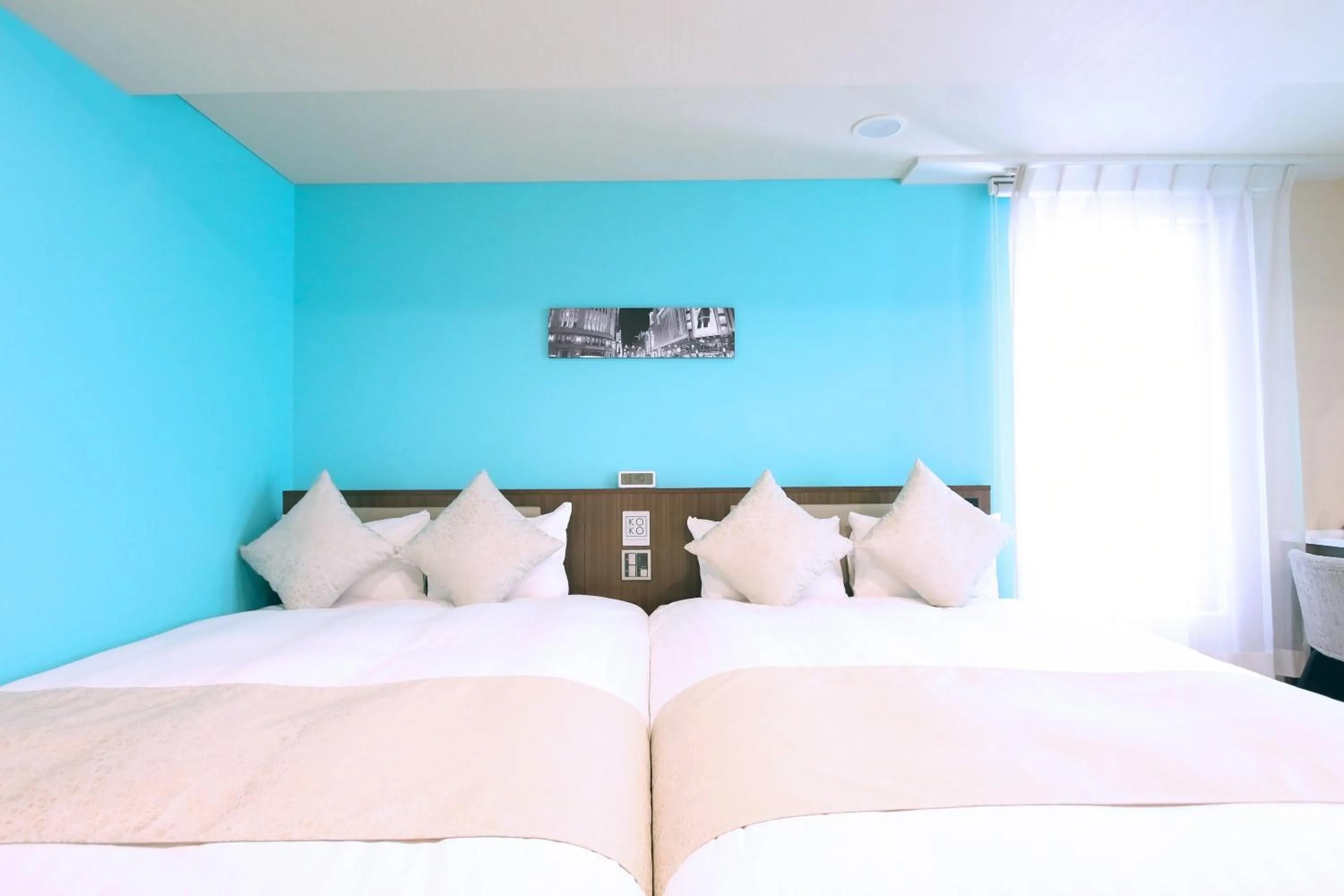 Bed in KOKO HOTEL Ginza-1chome