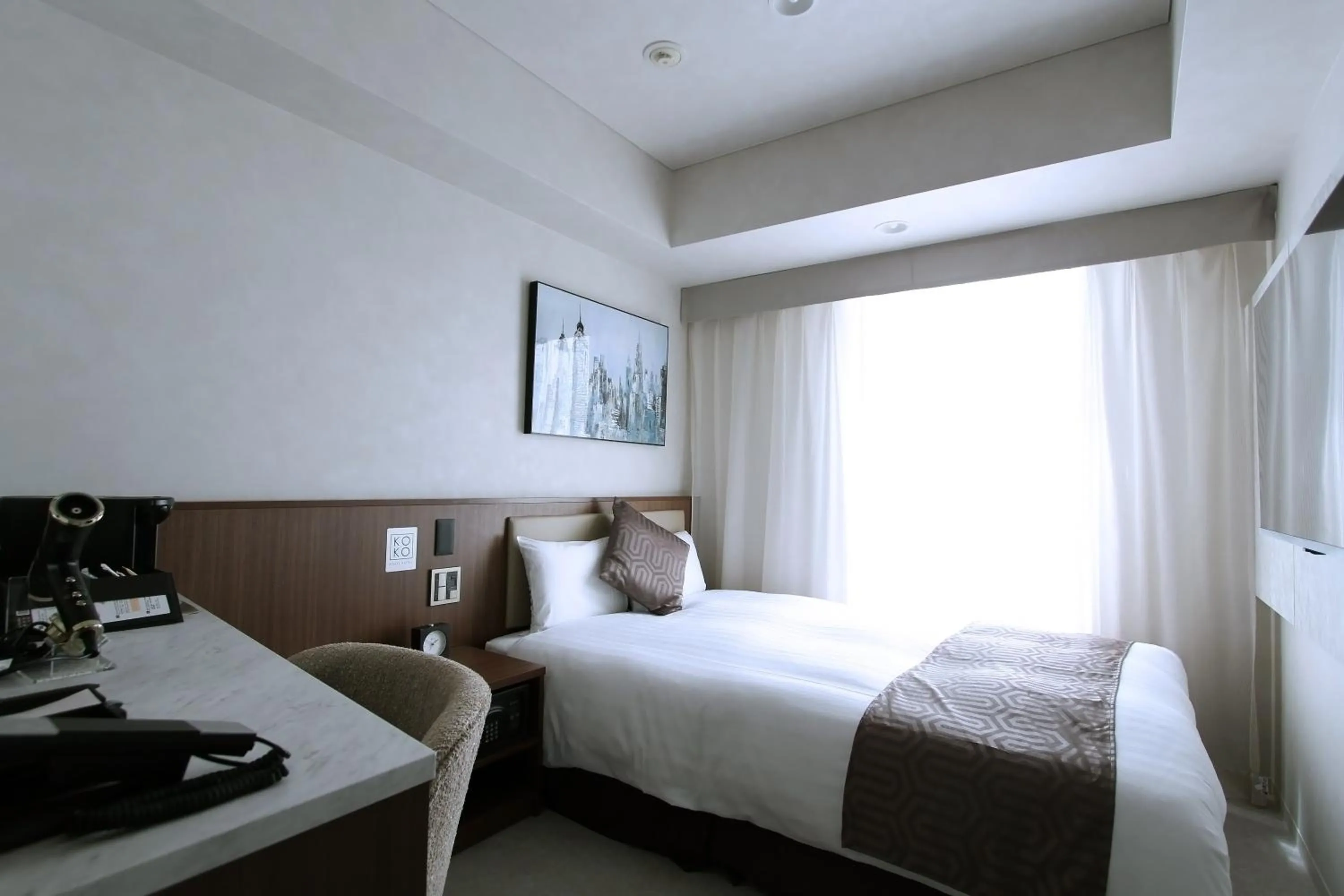 Photo of the whole room, Bed in KOKO HOTEL Ginza-1chome