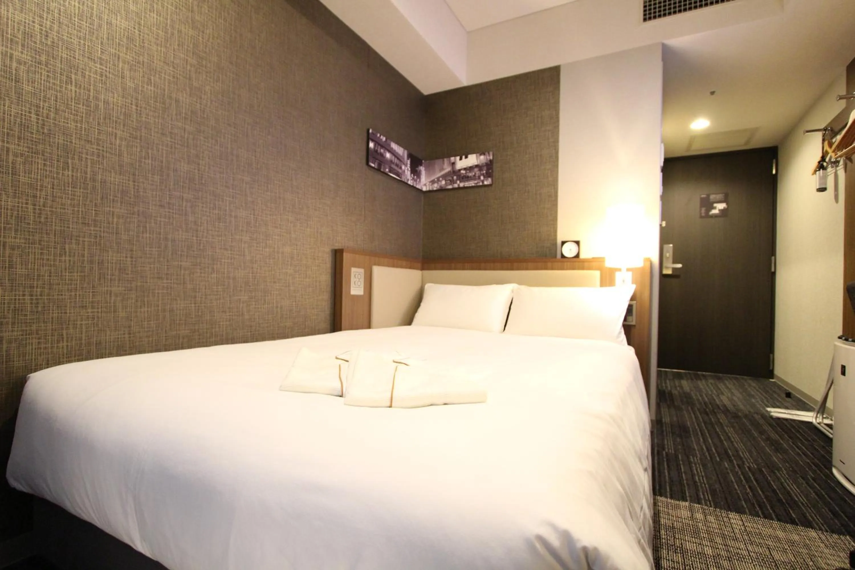 Photo of the whole room, Bed in KOKO HOTEL Ginza-1chome