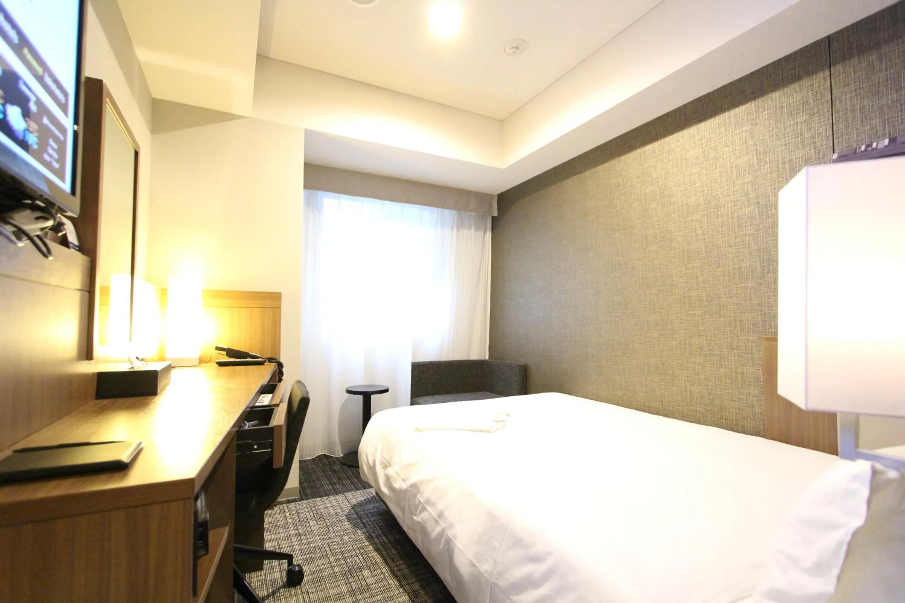 Photo of the whole room, Bed in KOKO HOTEL Ginza-1chome