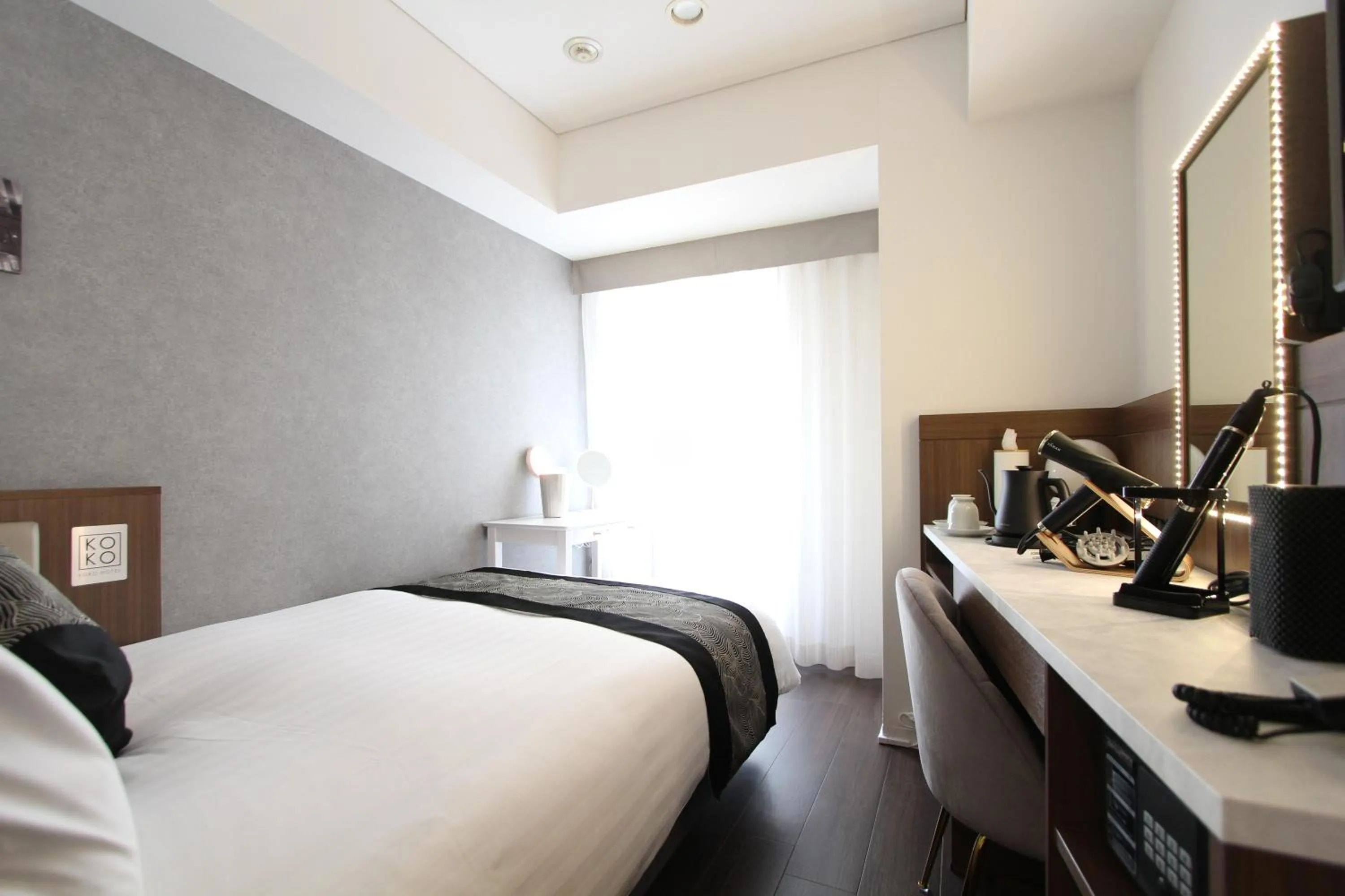 Photo of the whole room, Bed in KOKO HOTEL Ginza-1chome