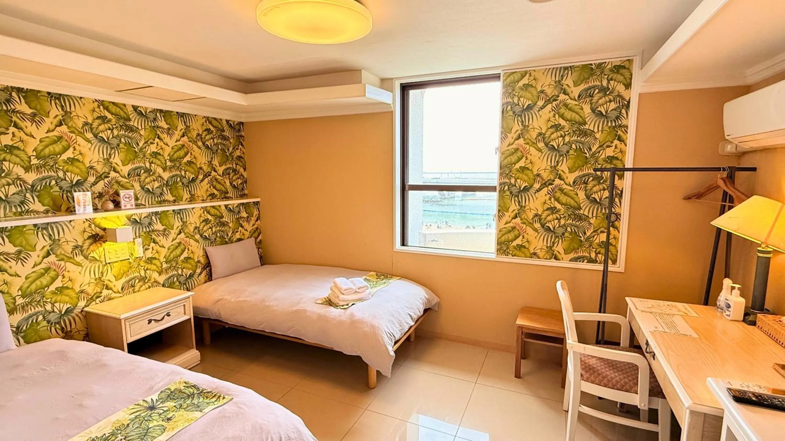Bed in Hotel GALA Naha's only sandy beach front all rooms oceanview