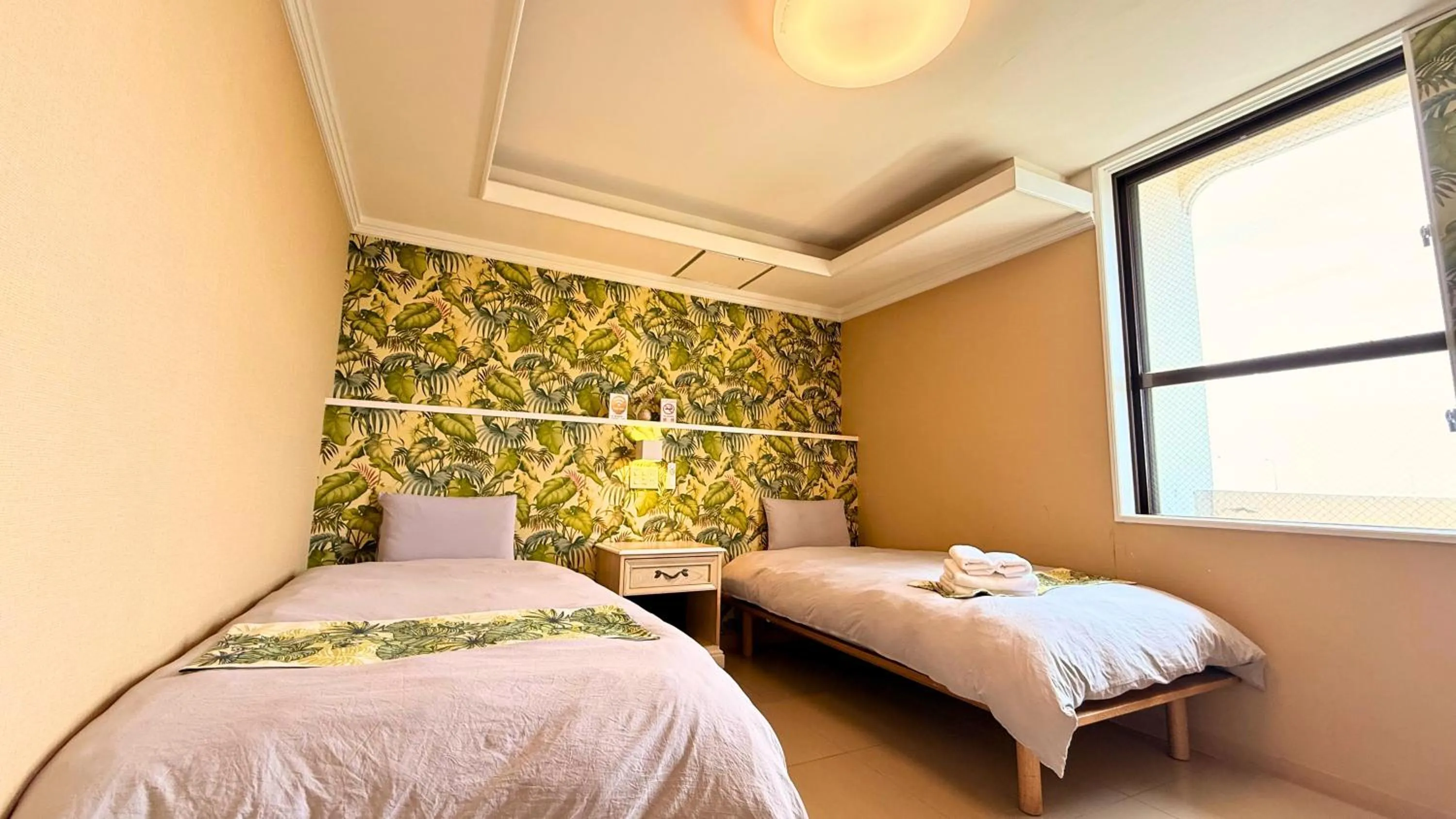 Bed in Hotel GALA Naha's only sandy beach front all rooms oceanview