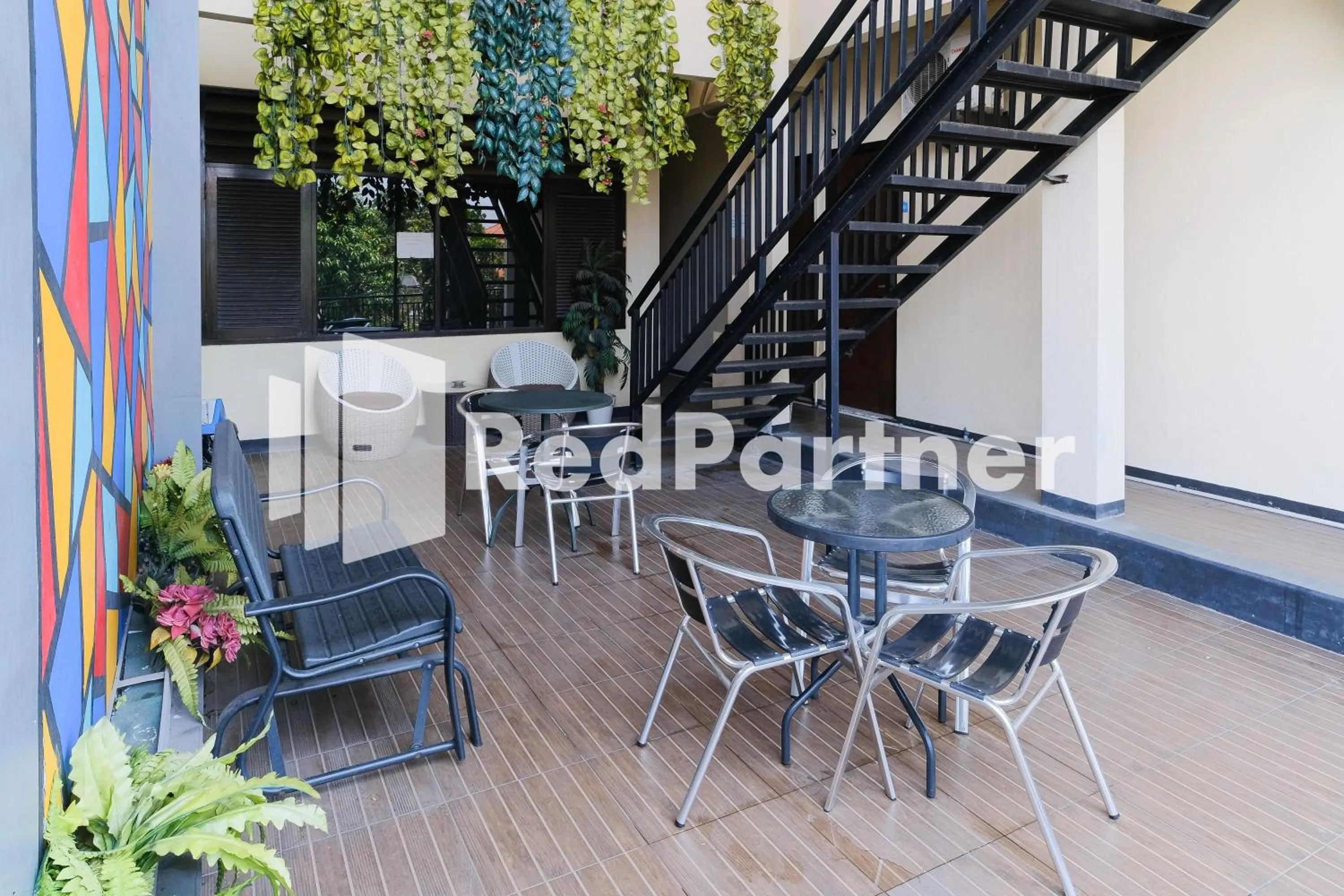 Balcony/Terrace in Dea Homestay Syariah at Kertomenanggal Surabaya Mitra RedDoorz