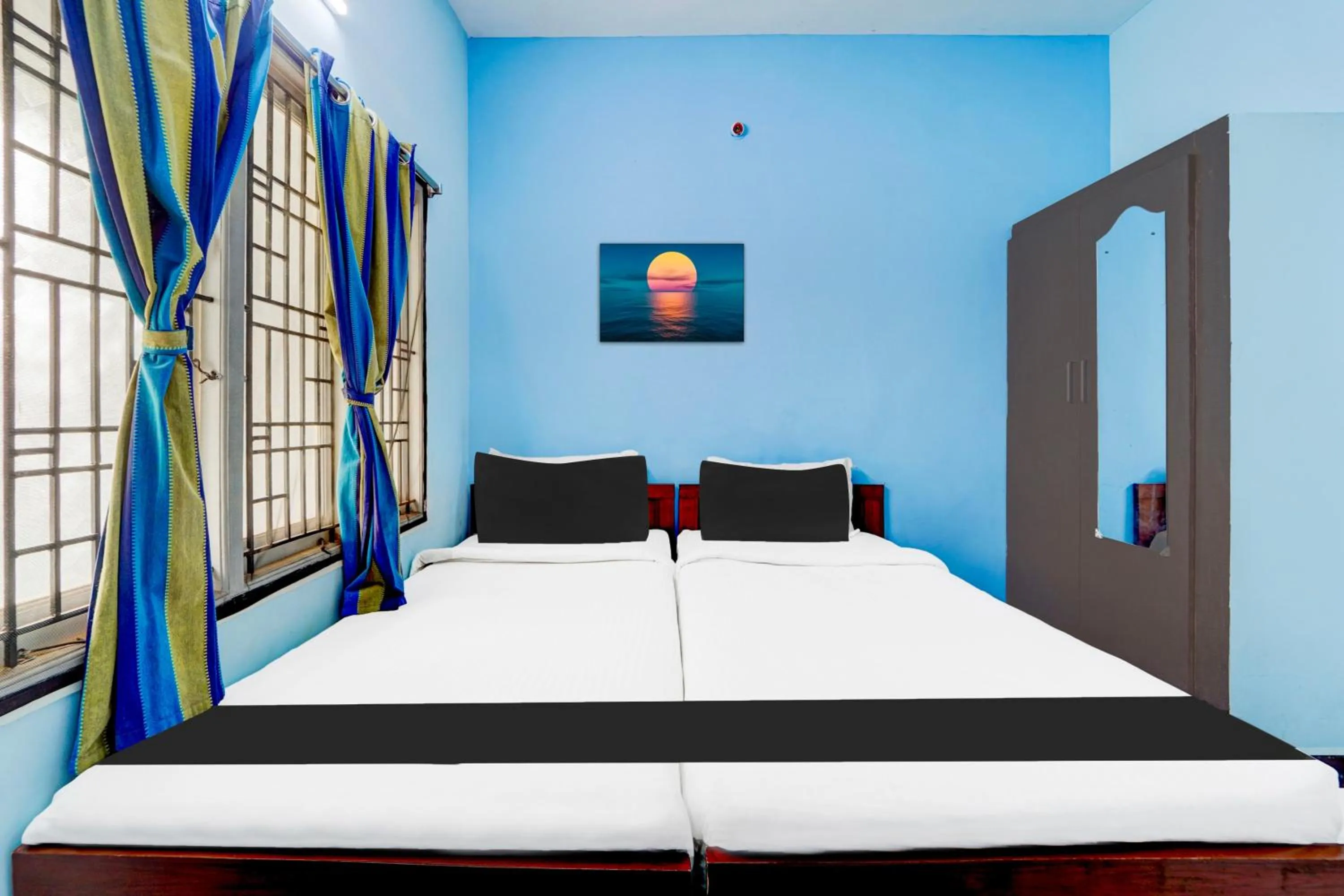 Bedroom in Super Hotel O Madurai Near Bus Stand