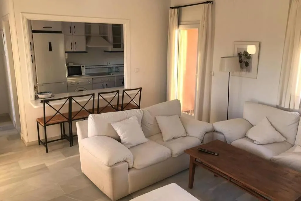 Communal lounge/ TV room in Precioso apartamento muy cerca de la playa