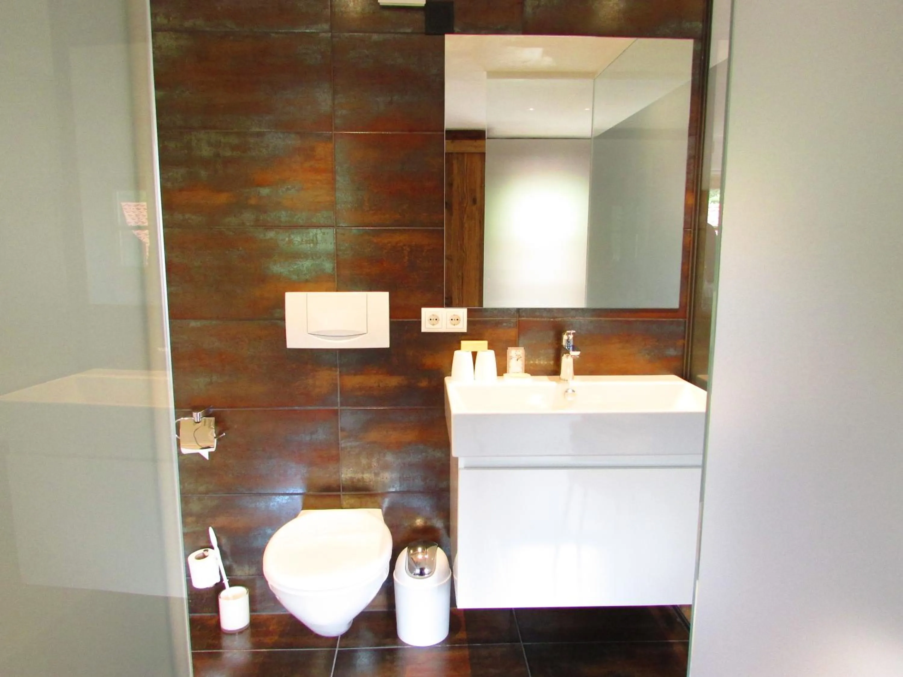 Bathroom in Feuriger Tatzlwurm Berghotel & Spa, BW Signature Collection