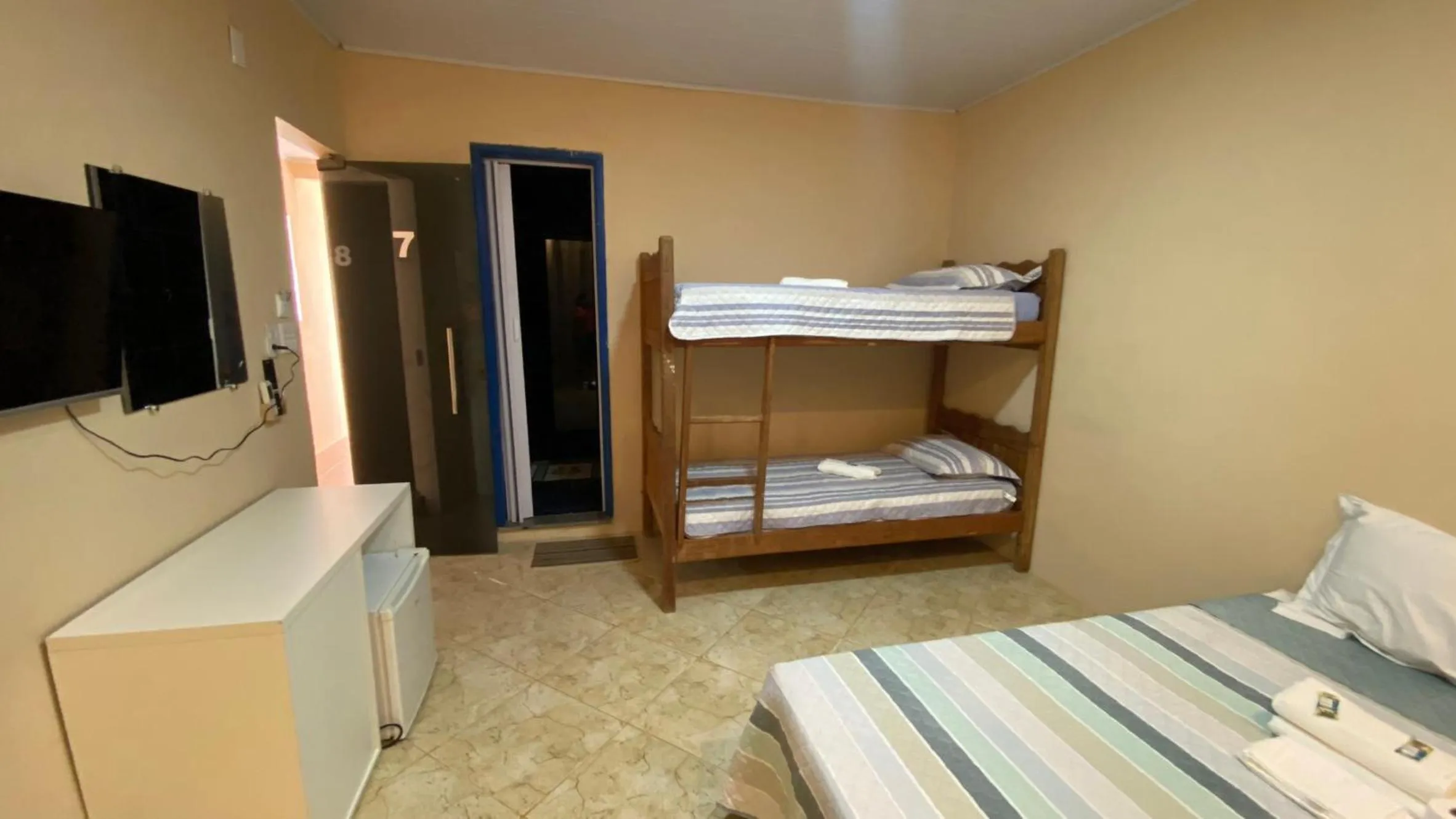 Property building, Bed in Pousada Floripes
