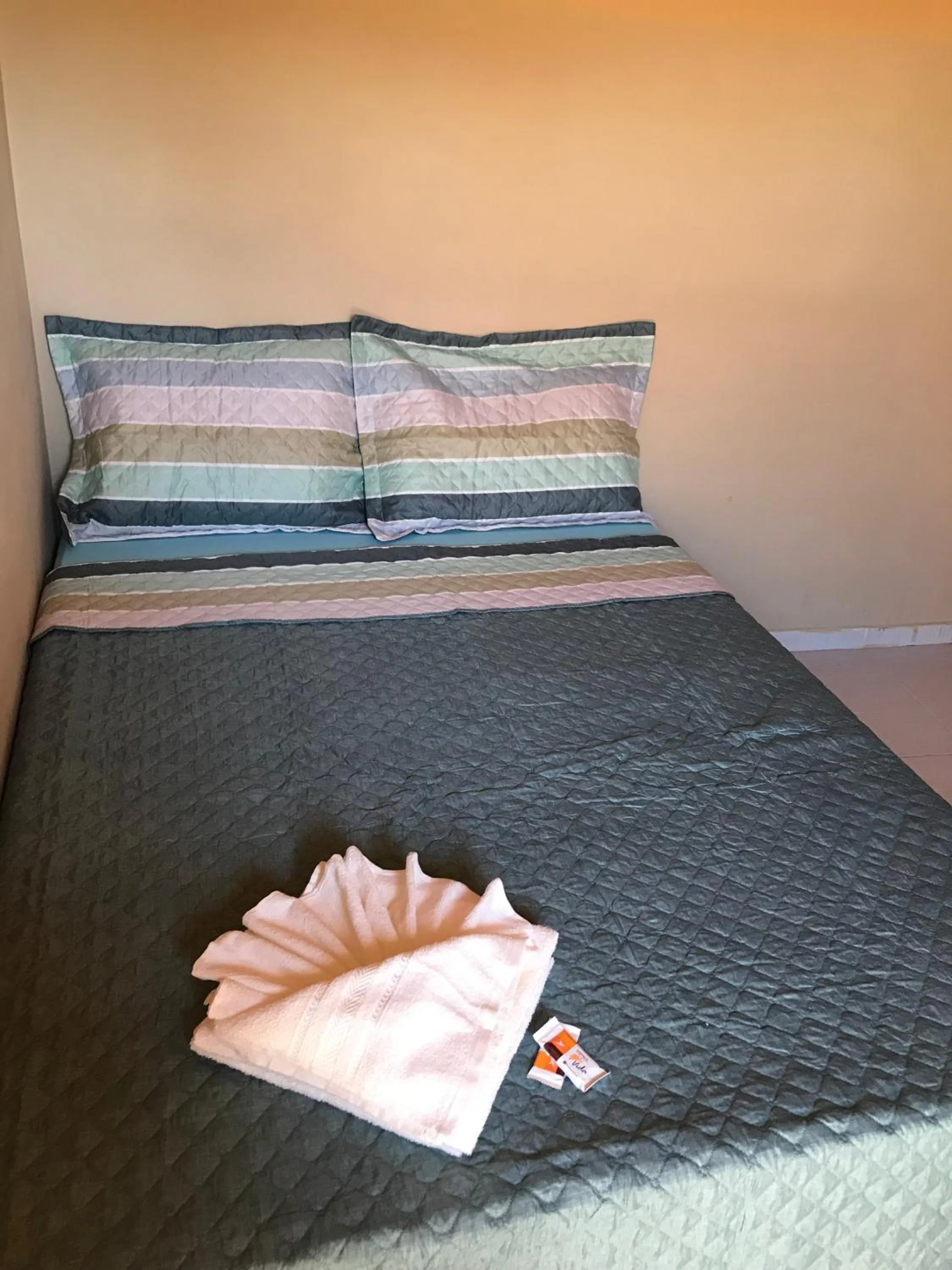 Bed in Pousada Floripes