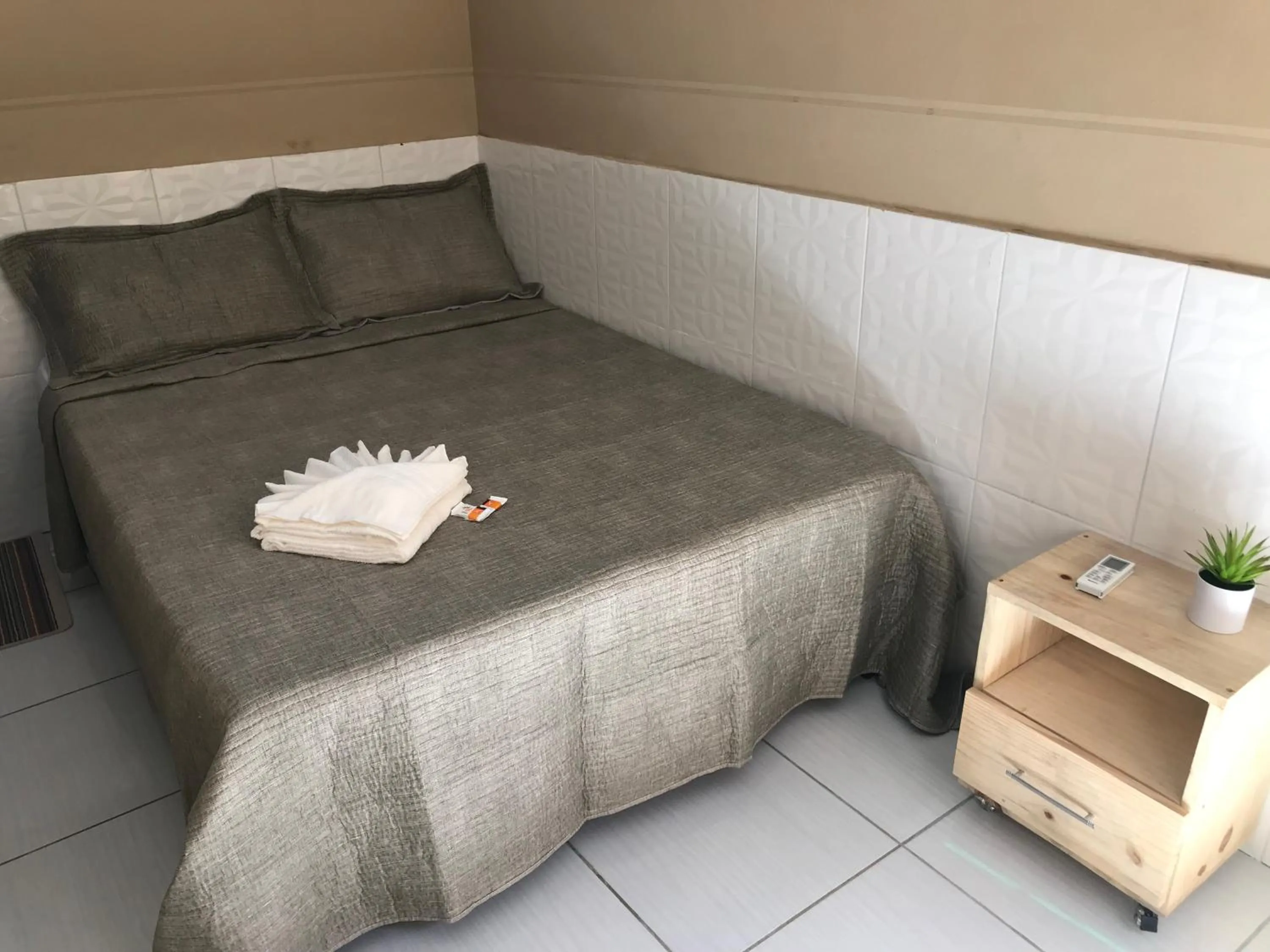 Bed in Pousada Floripes