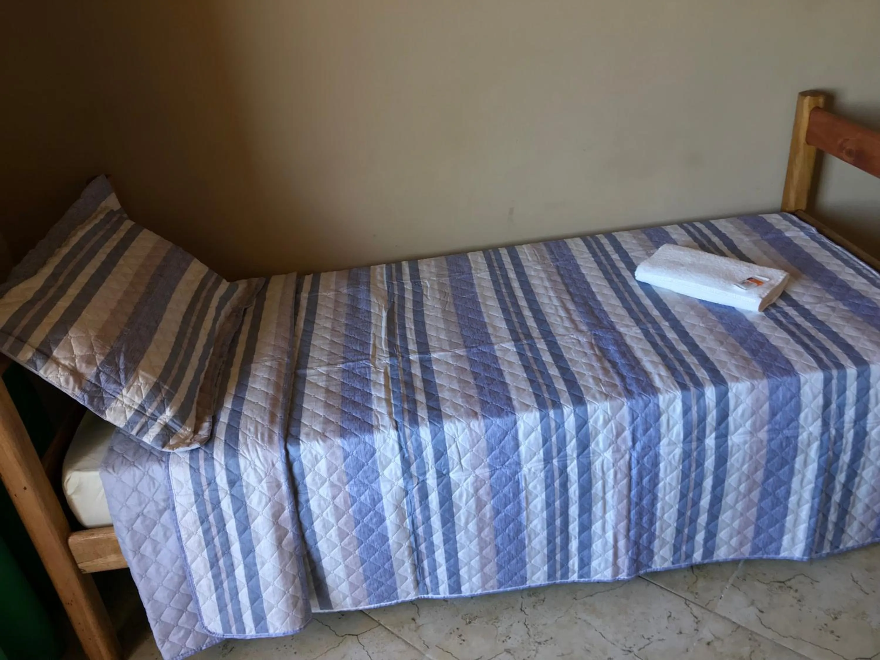 Bed in Pousada Floripes