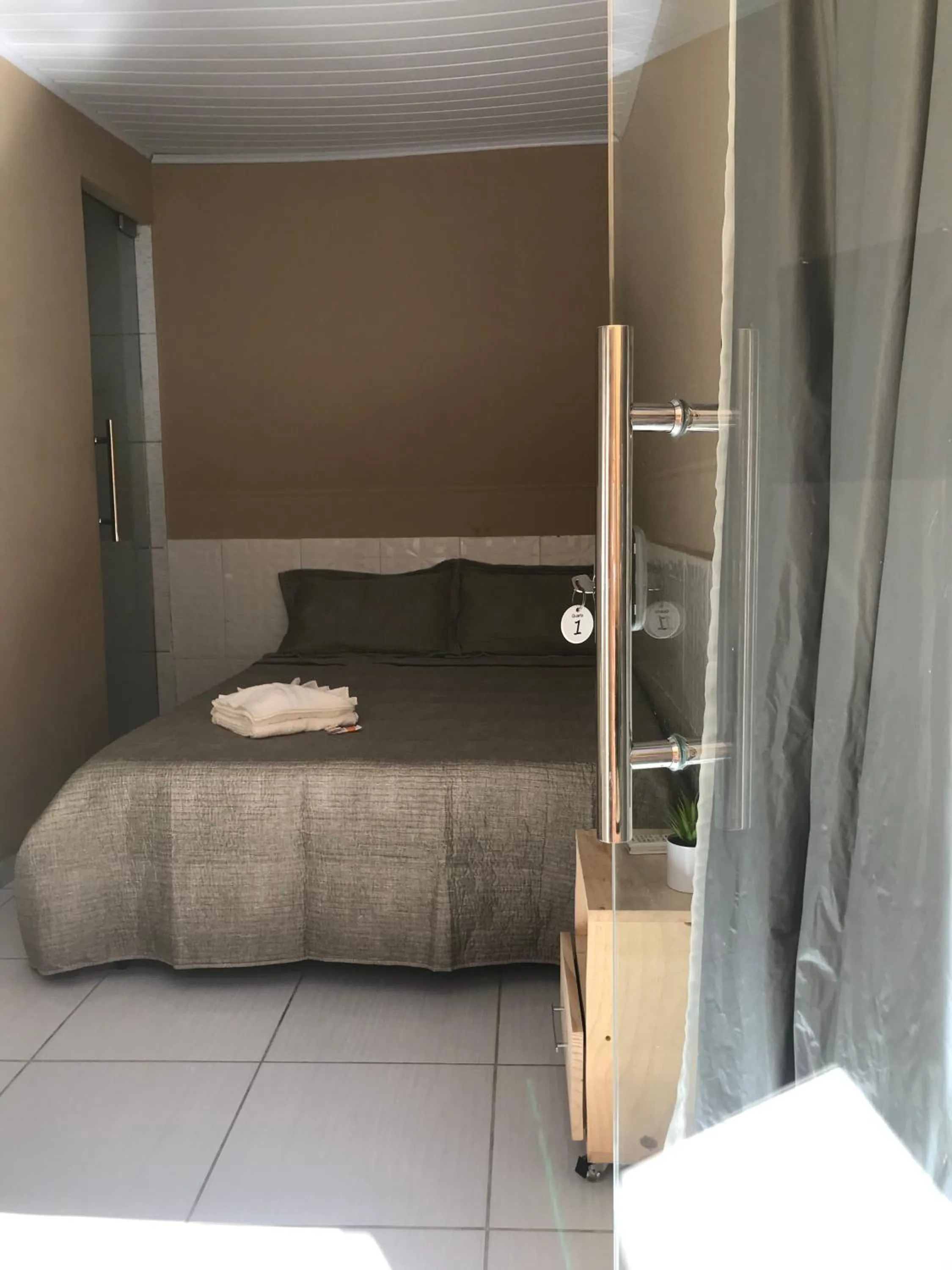 Bed in Pousada Floripes