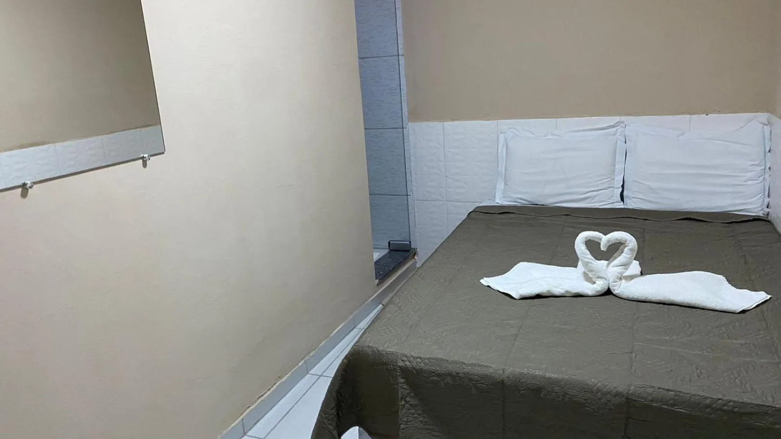 Bed in Pousada Floripes