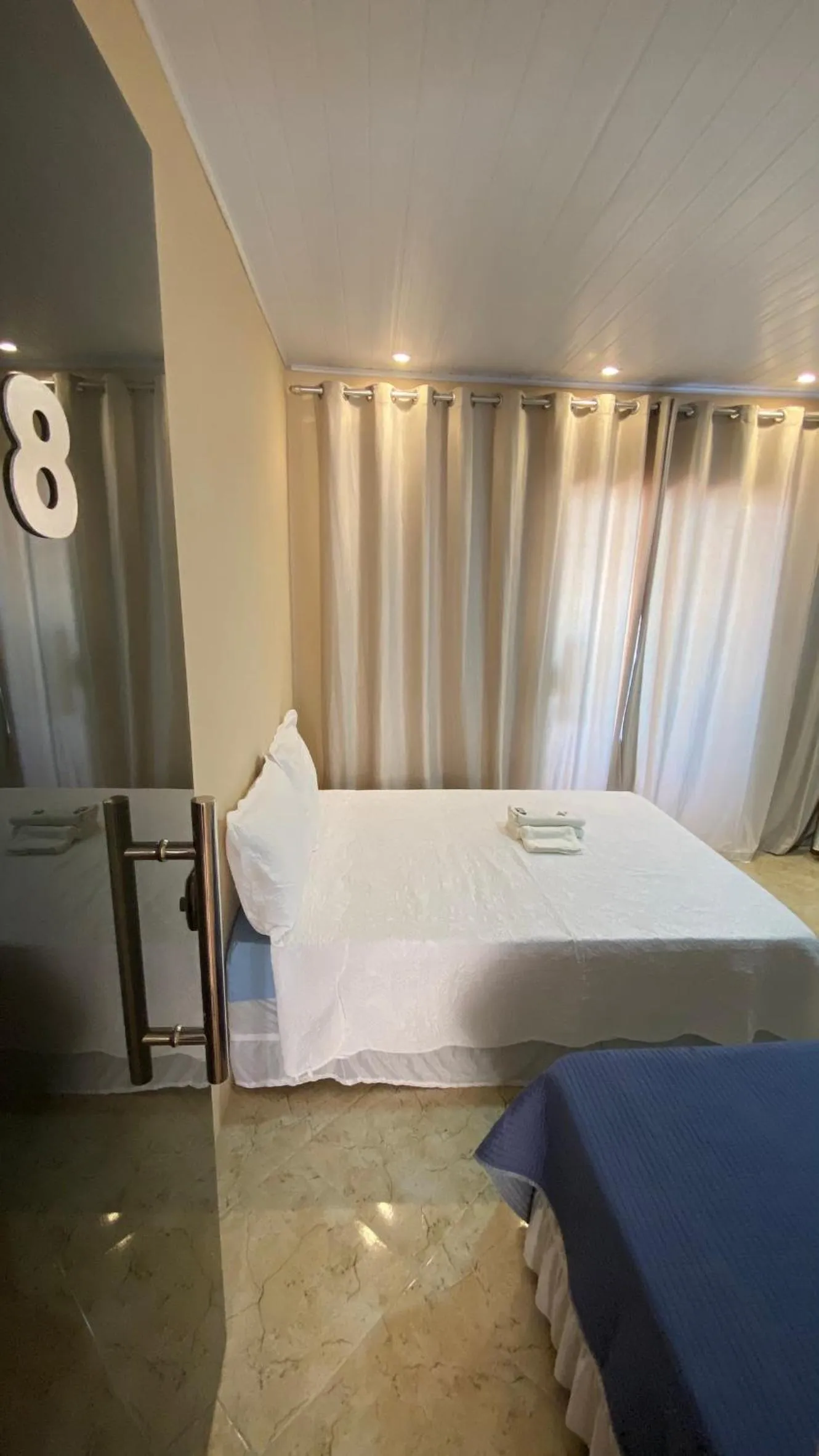 Property building, Bed in Pousada Floripes