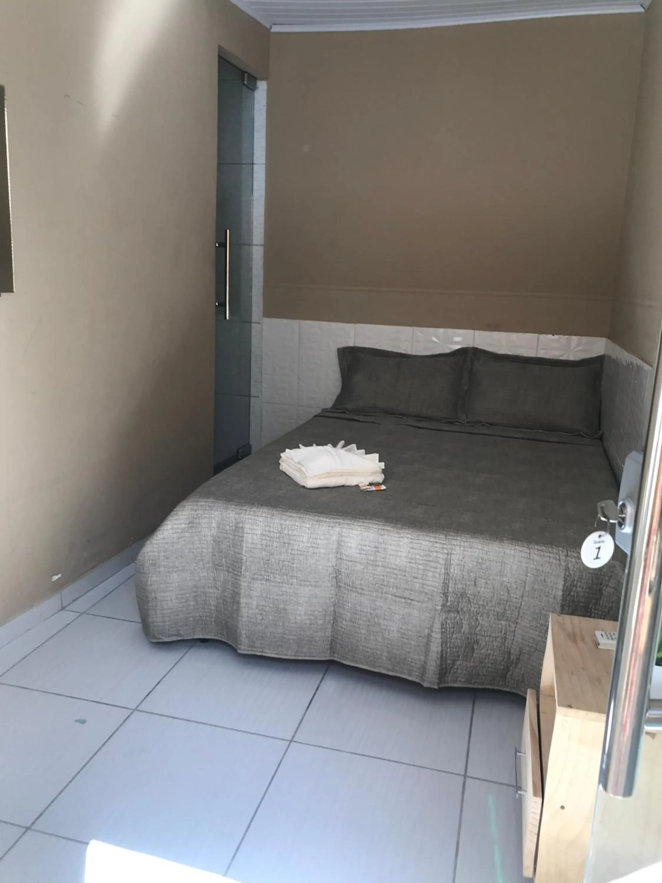 Bed in Pousada Floripes