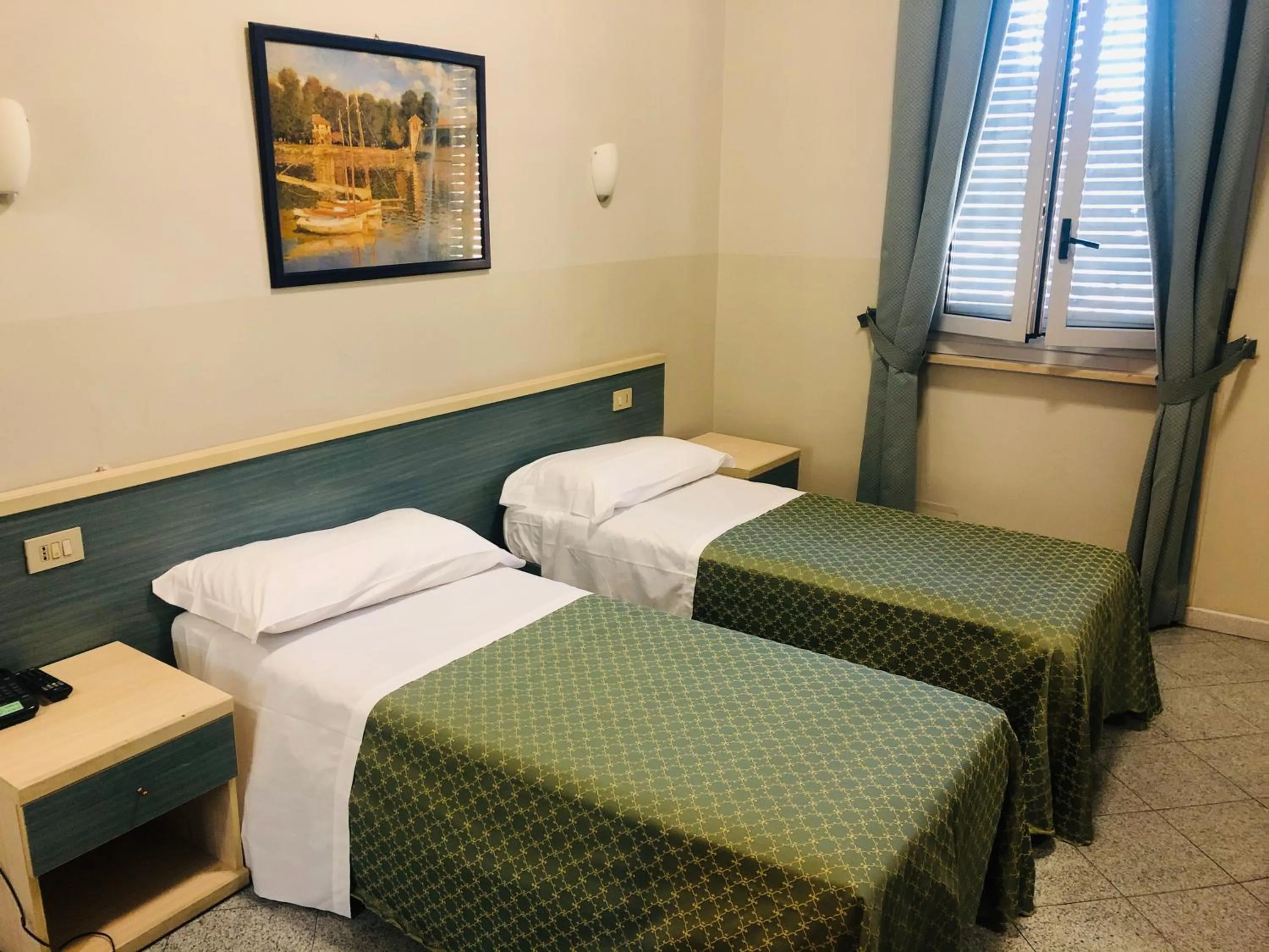 Bed in Hotel Ferrucci