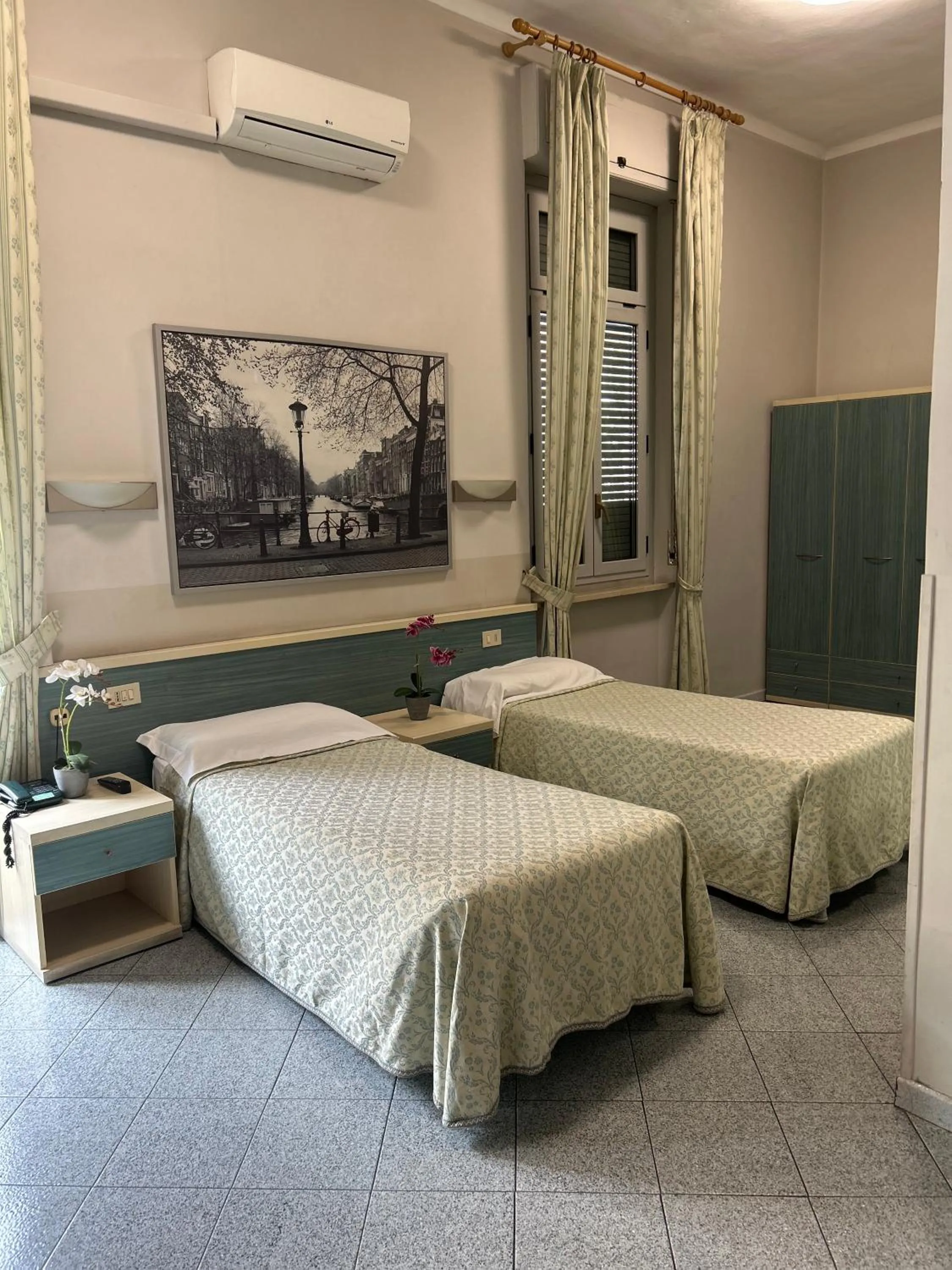 Bed in Hotel Ferrucci