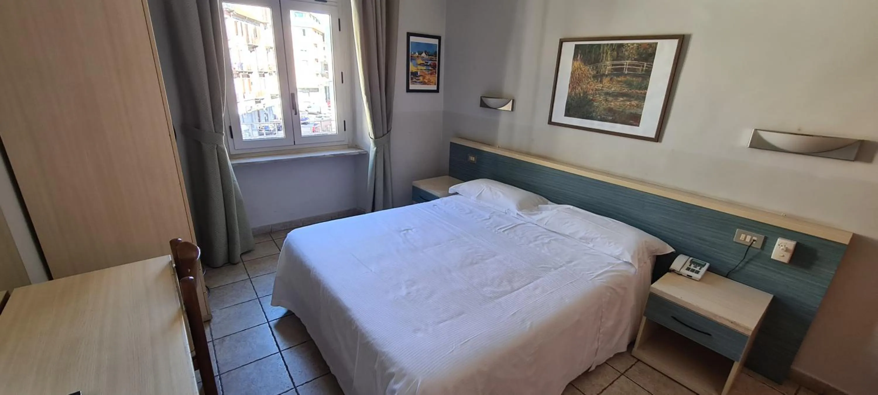 Bed in Hotel Ferrucci