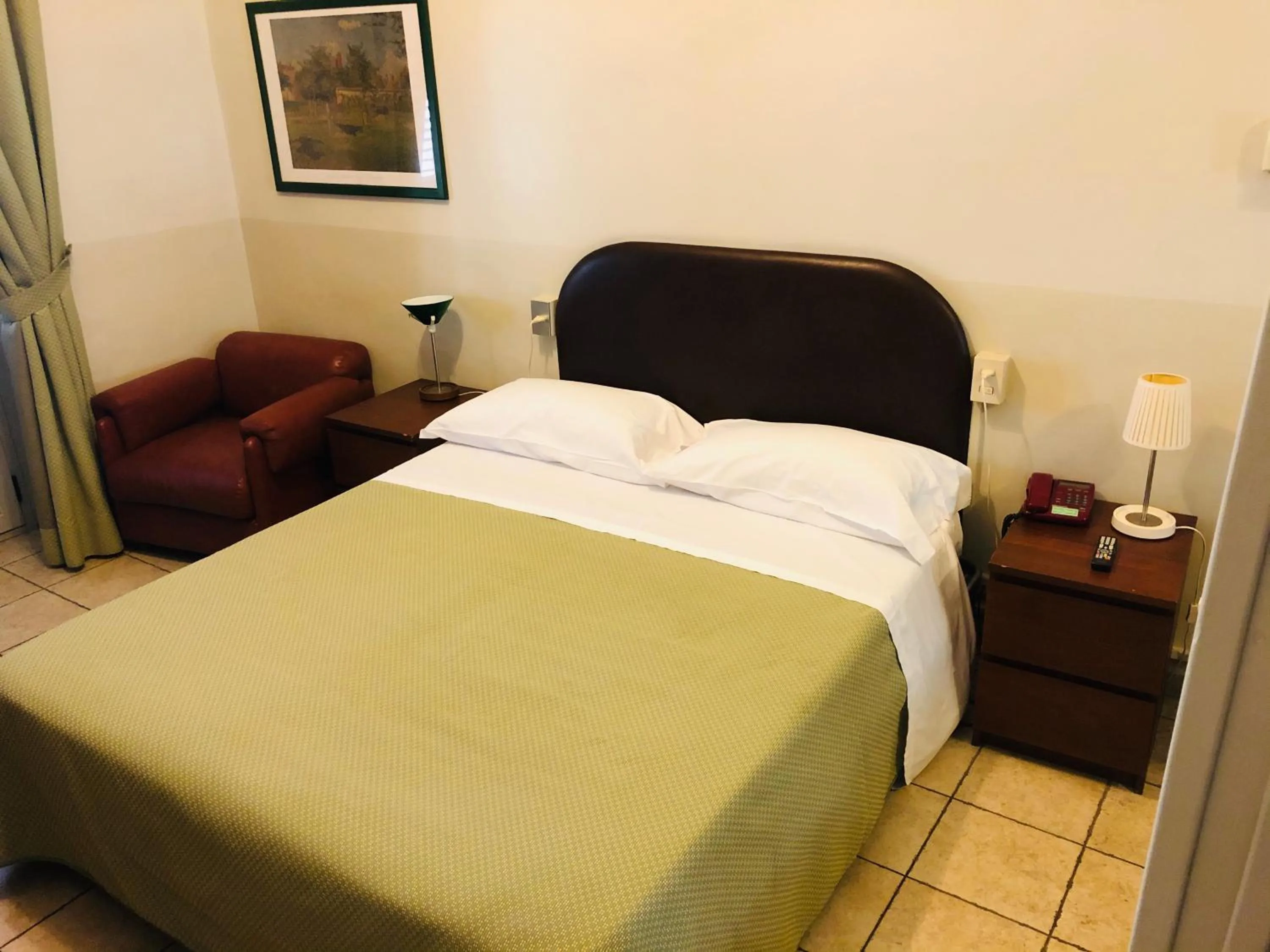 Bed in Hotel Ferrucci