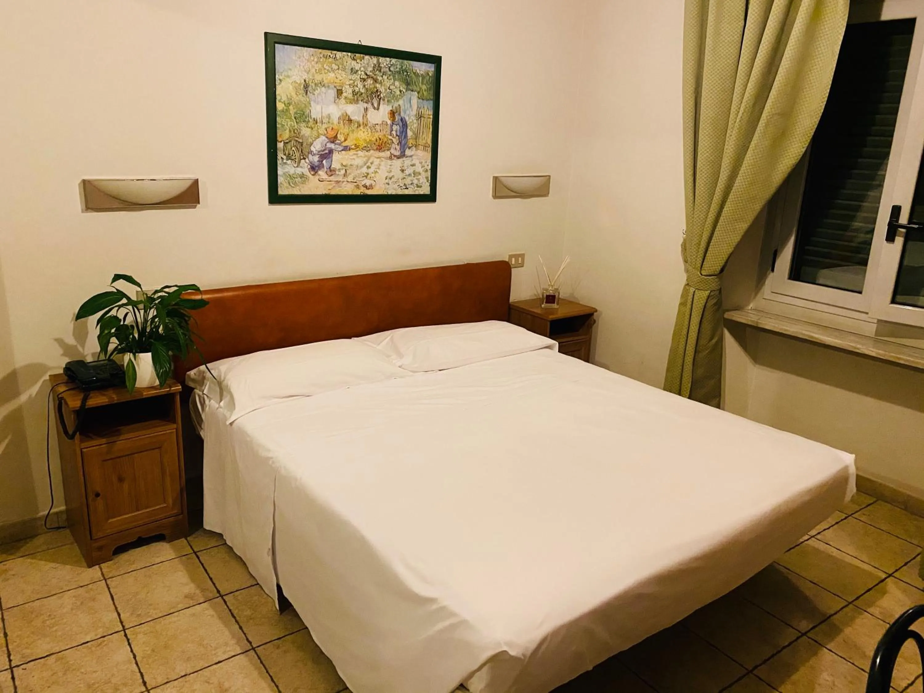 Bed in Hotel Ferrucci