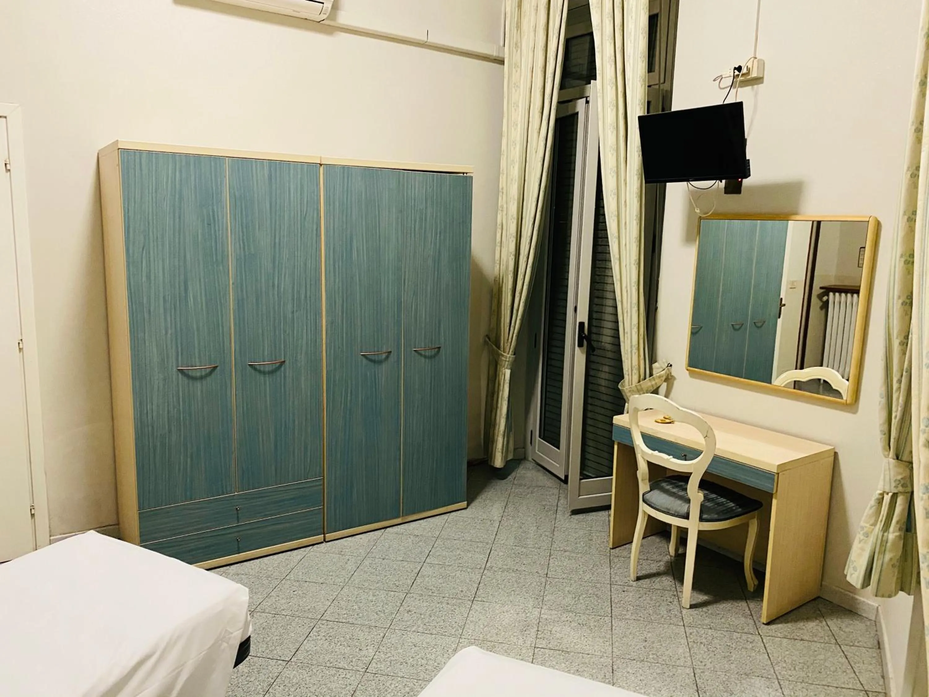 Bed in Hotel Ferrucci