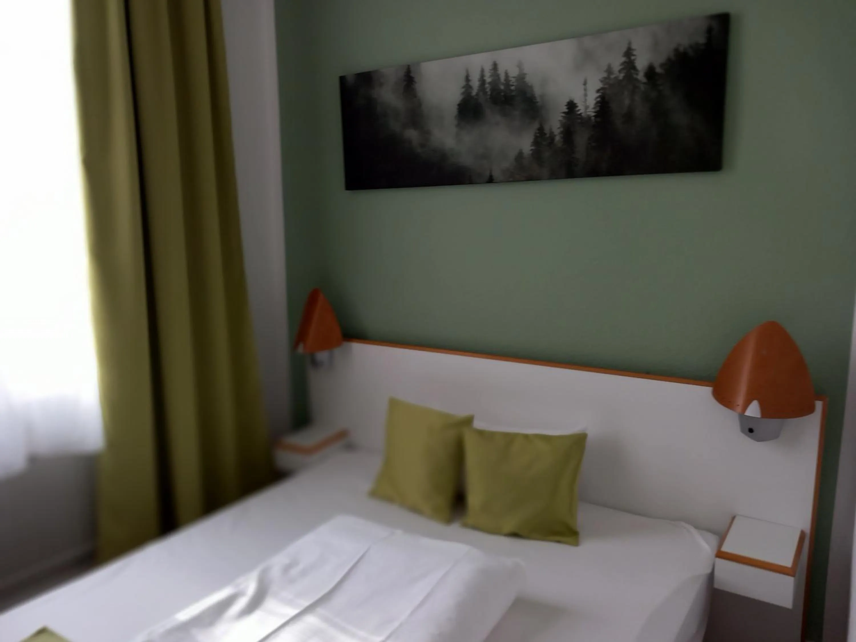 Bed in Hotel Karolinger - Self Check-In